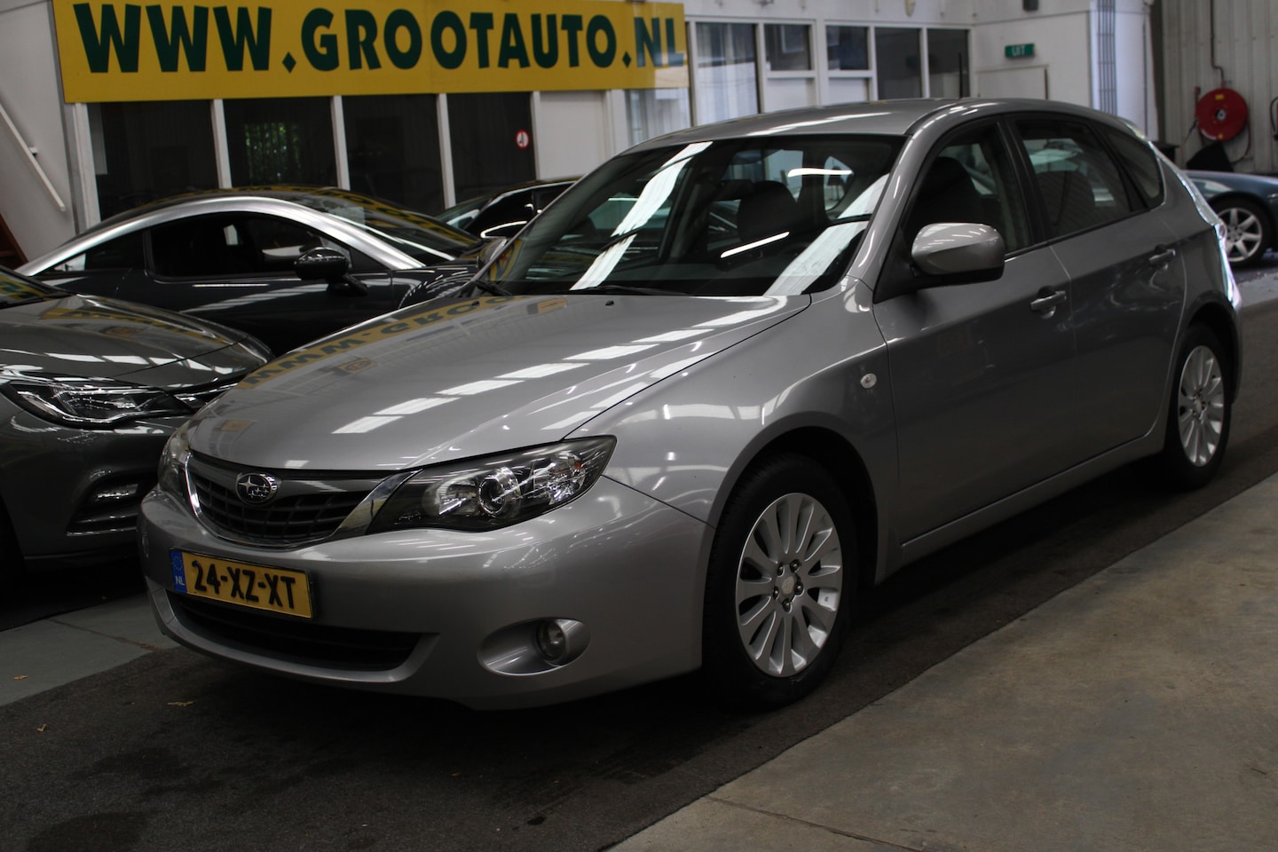 Subaru Impreza - 2.0R Luxury AWD Airco, Cruise Control, Stuurbekrachtiging - AutoWereld.nl