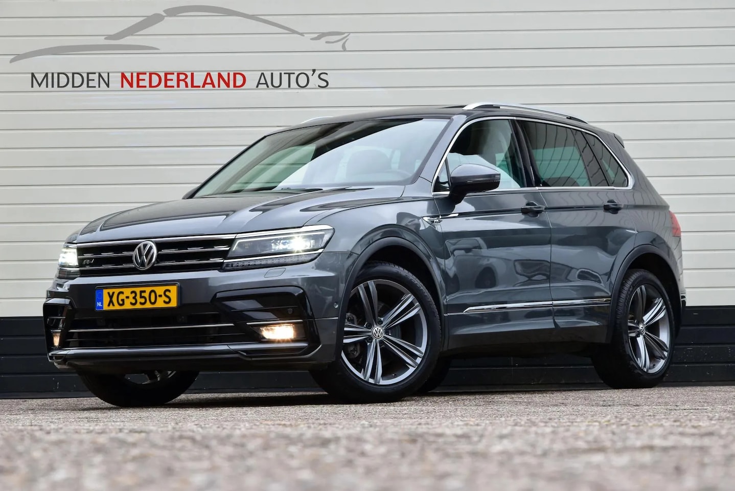 Volkswagen Tiguan - 2.0 TSI 4Motion Highline * R-LINE * PANORAMA * - AutoWereld.nl