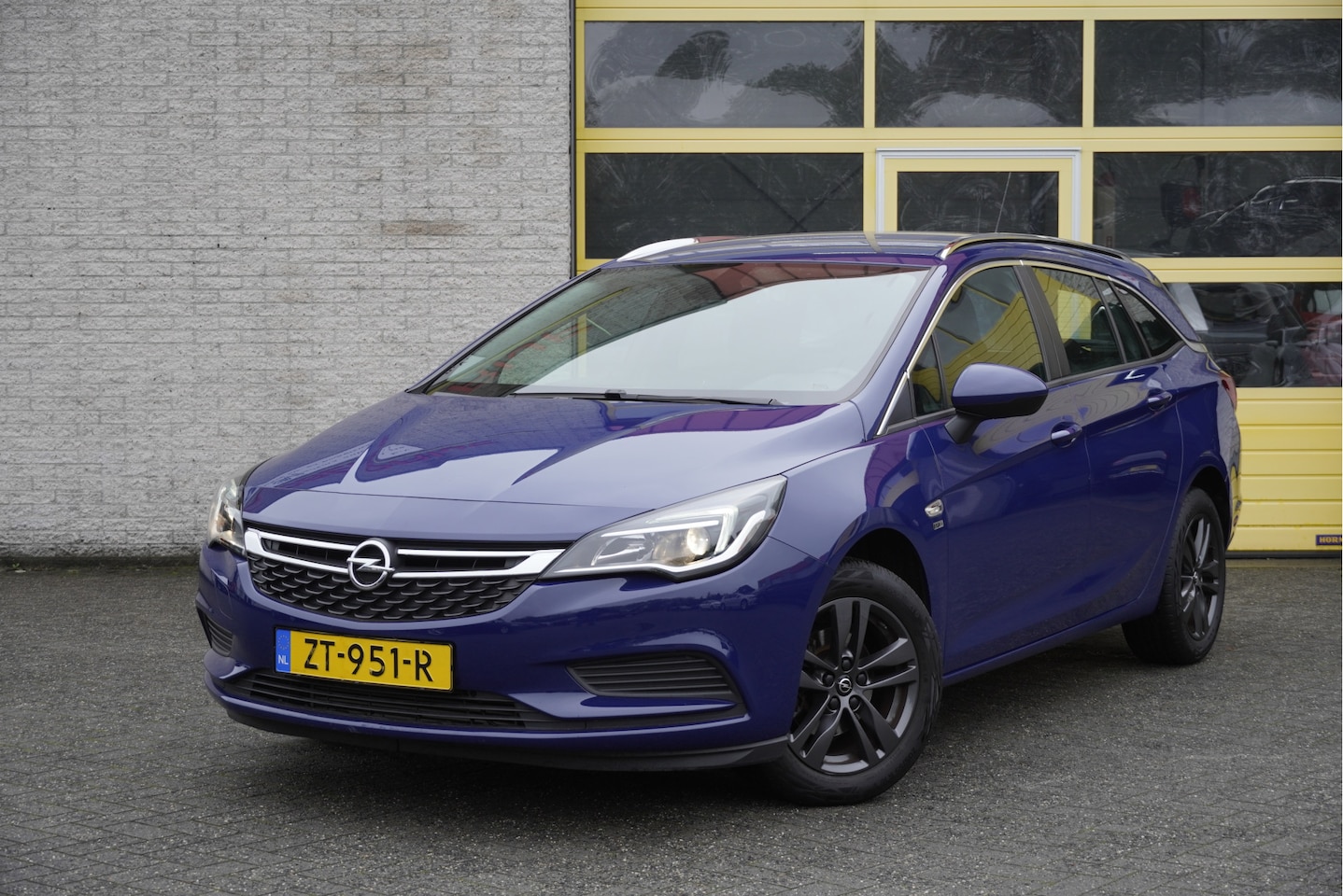 Opel Astra Sports Tourer - 1.4 Turbo 150PK! 120 Jaar Edition BJ2019 Lmv 16" | Led | Navi | Airco | Cruise control | G - AutoWereld.nl