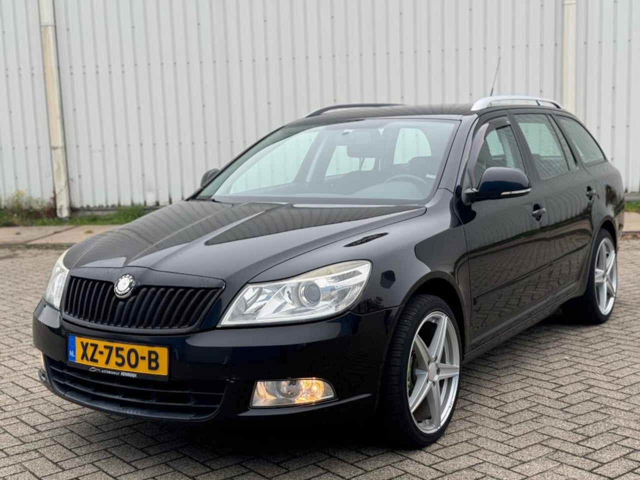 Skoda Octavia Combi - 1.8 TSI Elegance Clima Navi - AutoWereld.nl