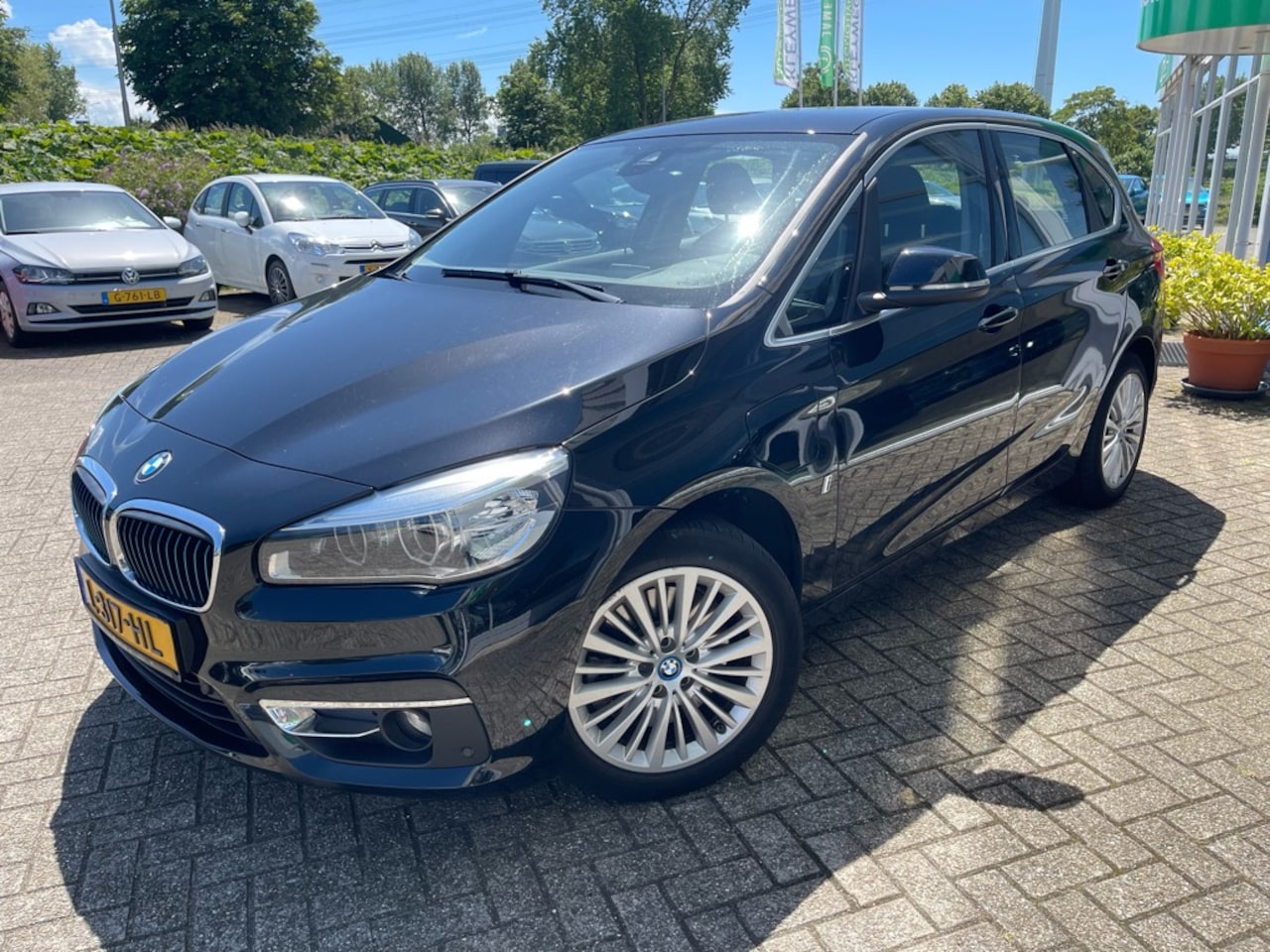 BMW 2-serie Active Tourer - 225xe iP Executive, Nav, Leder, Sportstoel, Stoelverw. - AutoWereld.nl