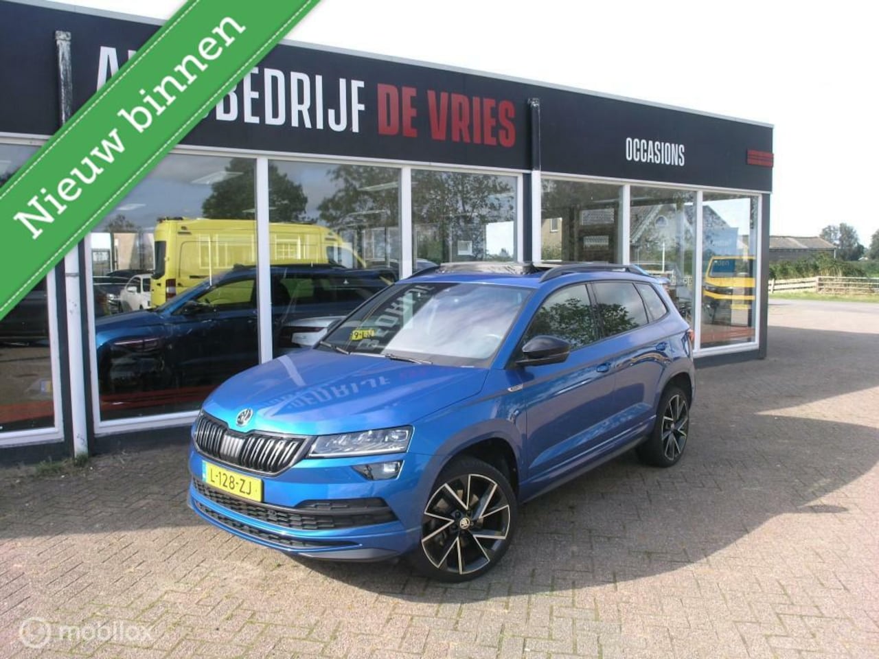 Skoda Karoq - 1.5 TSI ACT Sportline Pano/ACC/Virtual/Newmodel - AutoWereld.nl