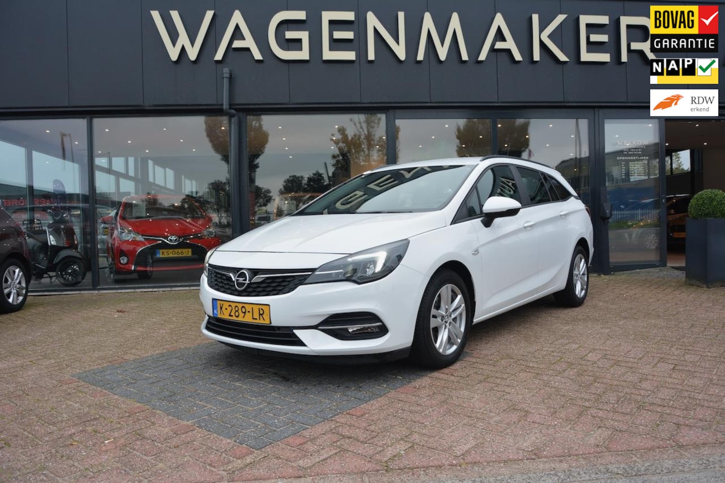 Opel Astra Sports Tourer - 1.4 Busines Edition AUT|NAV|Carplay - AutoWereld.nl