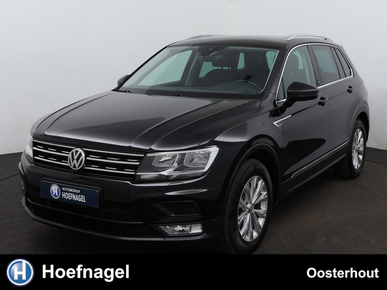 Volkswagen Tiguan - 1.4 TSI ACT Comfortline Business Navigatie | Camera | Adaptive Cruise Control | Stoelverwa - AutoWereld.nl