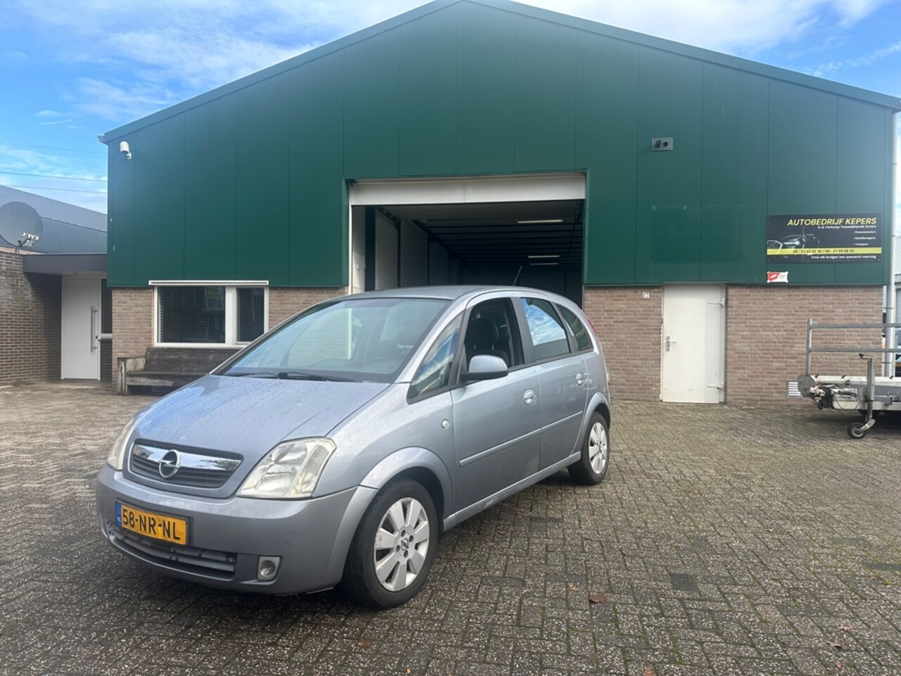 Opel Meriva - 1.6 Cosmo Airco LM velgen NIEUWE APK - AutoWereld.nl