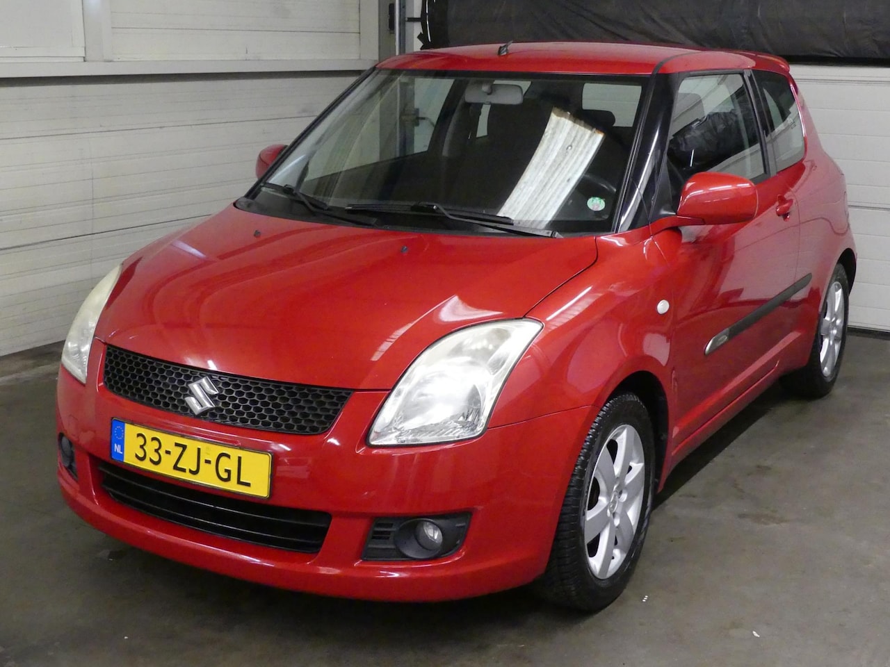 Suzuki Swift - 1.3 Exclusive - Automaat - Airco - Trekhaak - AutoWereld.nl