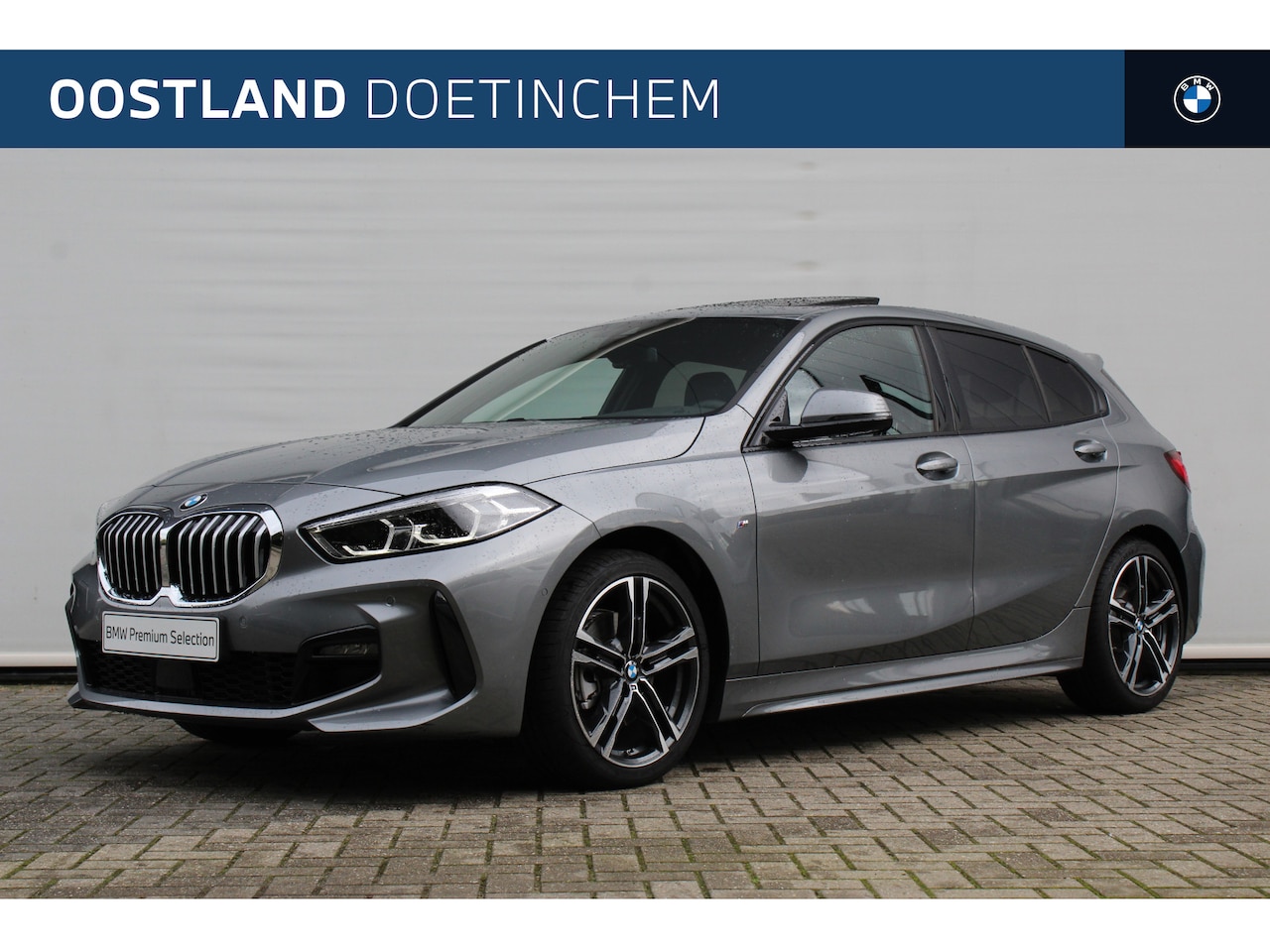 BMW 1-serie - 118i High Executive M Sport Automaat / Panoramadak / Trekhaak / Sportstoelen / LED / M Spo - AutoWereld.nl