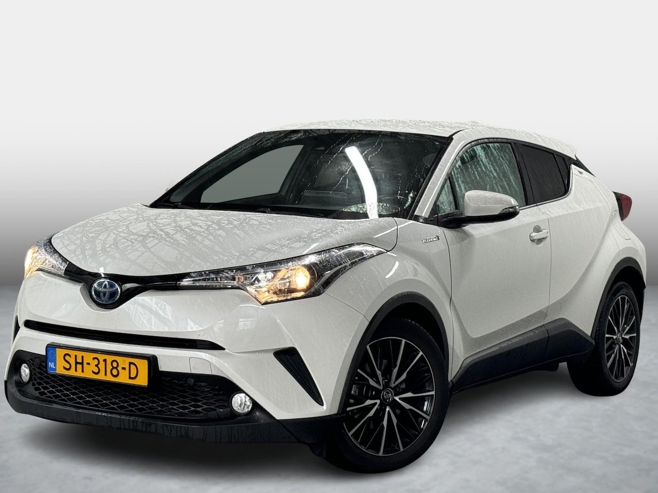 Toyota C-HR - 1.8 Hybrid Dynamic 1ste Eig Navi Stoelverw. - AutoWereld.nl