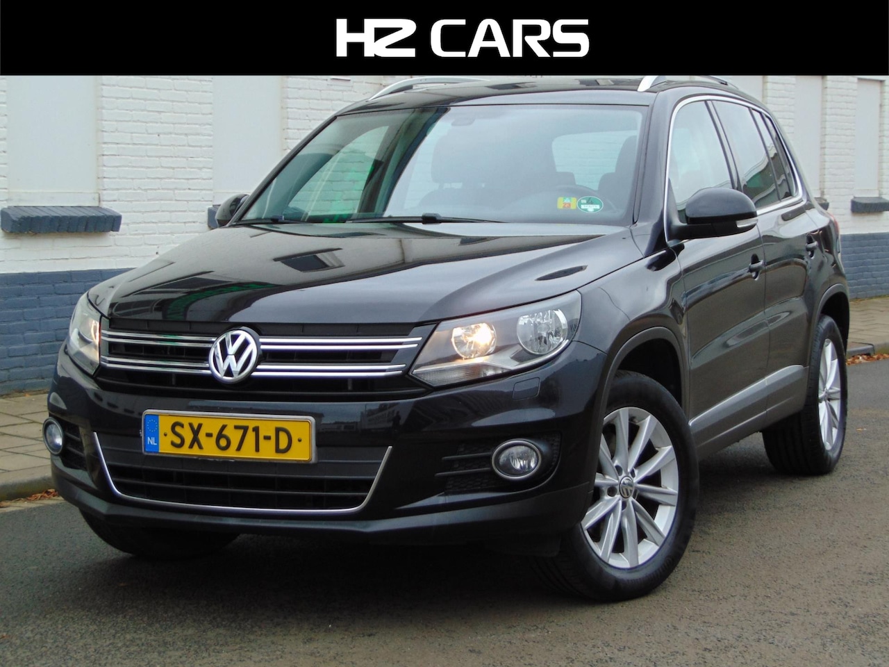 Volkswagen Tiguan - 1.4 TSI Sport&Style MET NIEUWE APK - AutoWereld.nl