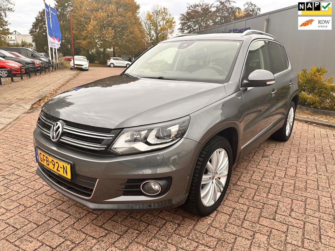 Volkswagen Tiguan - 2.0 TDI Sport&Style 4Motion Cup uitvoering volle opties - AutoWereld.nl