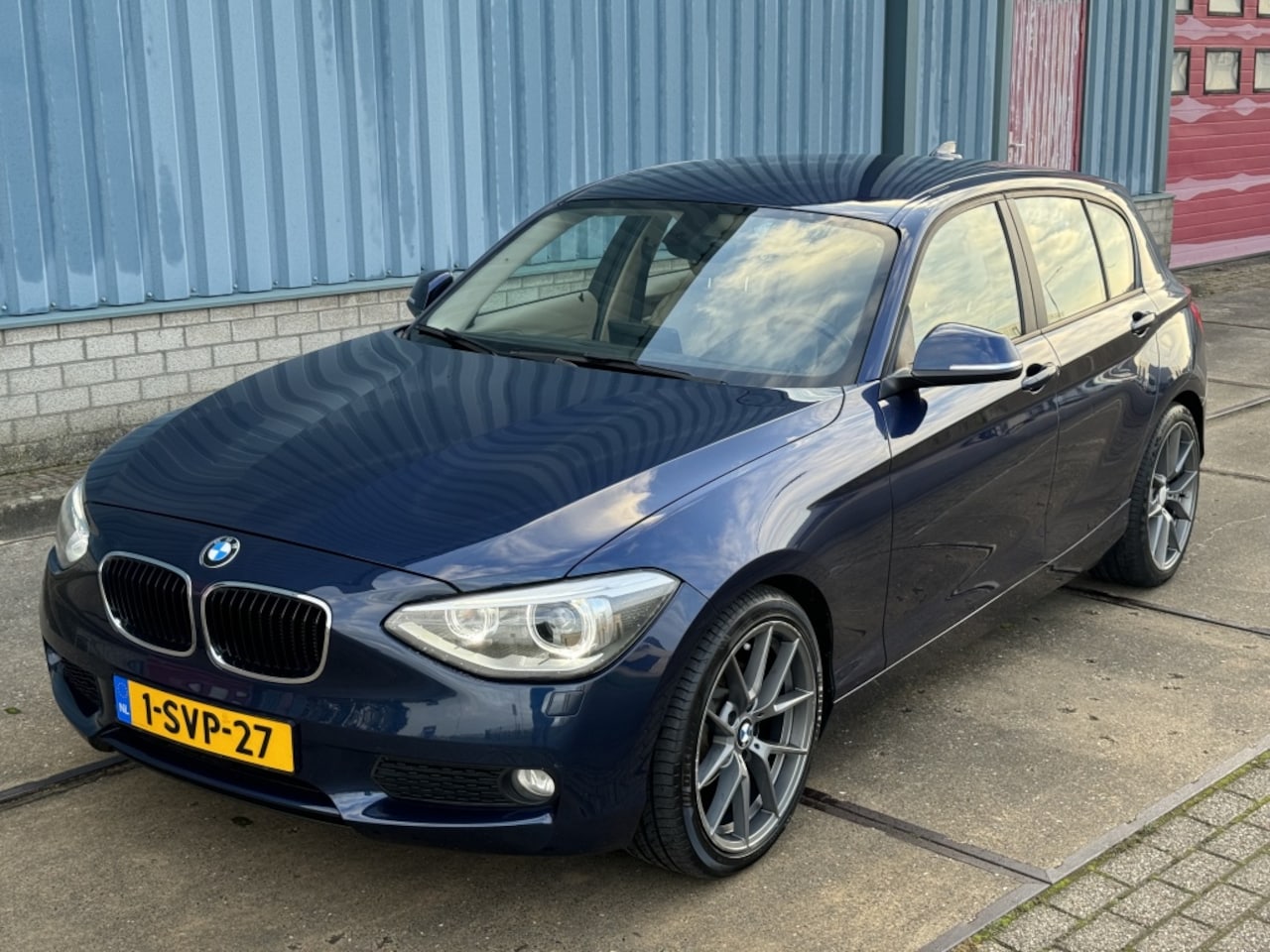 BMW 1-serie - 116i High Exe| LEER| NAVI| CRUISE| MEMORY| NAP| 18” - AutoWereld.nl