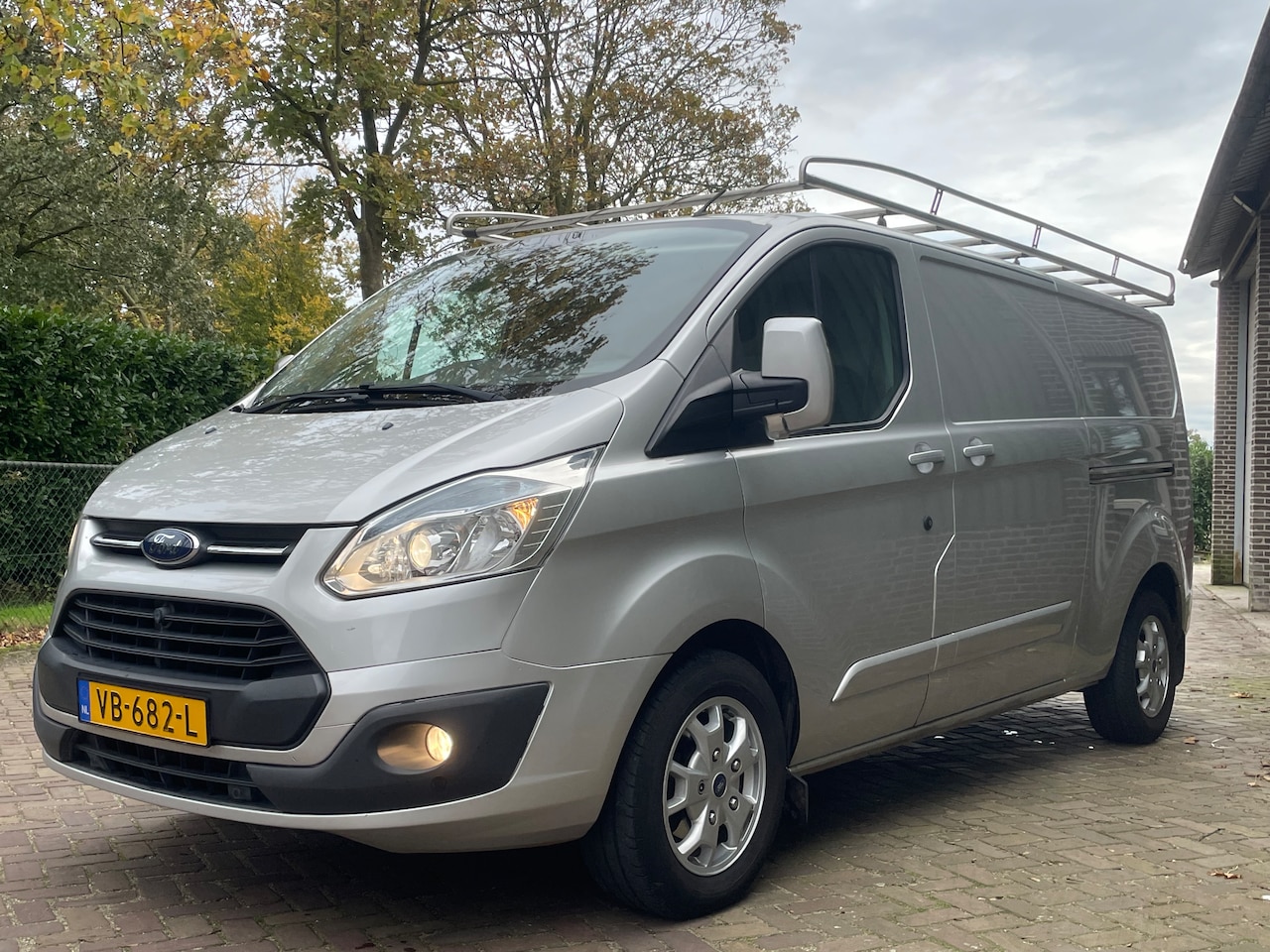 Ford Transit Custom - 290 2.2 TDCI L2H1 Limited Zeer complete Ford Custom met o.a. dubbele schuifdeur x2 - AutoWereld.nl