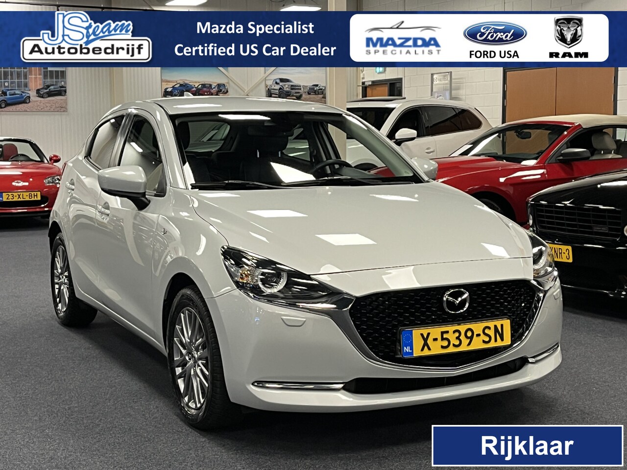 Mazda 2 - 1.5i SkyActiv-G Luxury Leder Navi DAB+ Apple CarPlay PDC - AutoWereld.nl