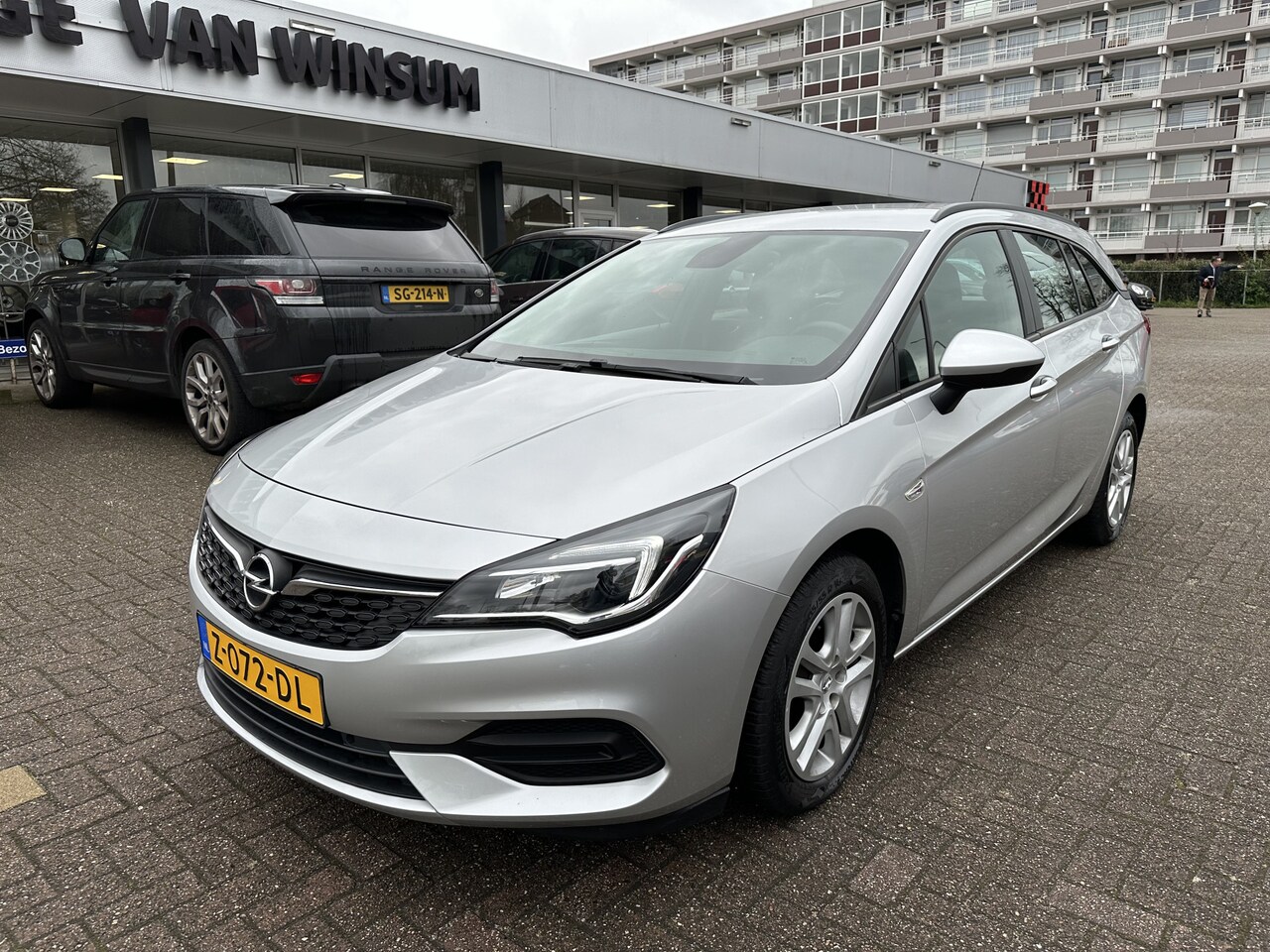 Opel Astra Sports Tourer - 1.4 Business Edition Automaat Navi Lmv Pdc Cruise Ned Auto - AutoWereld.nl