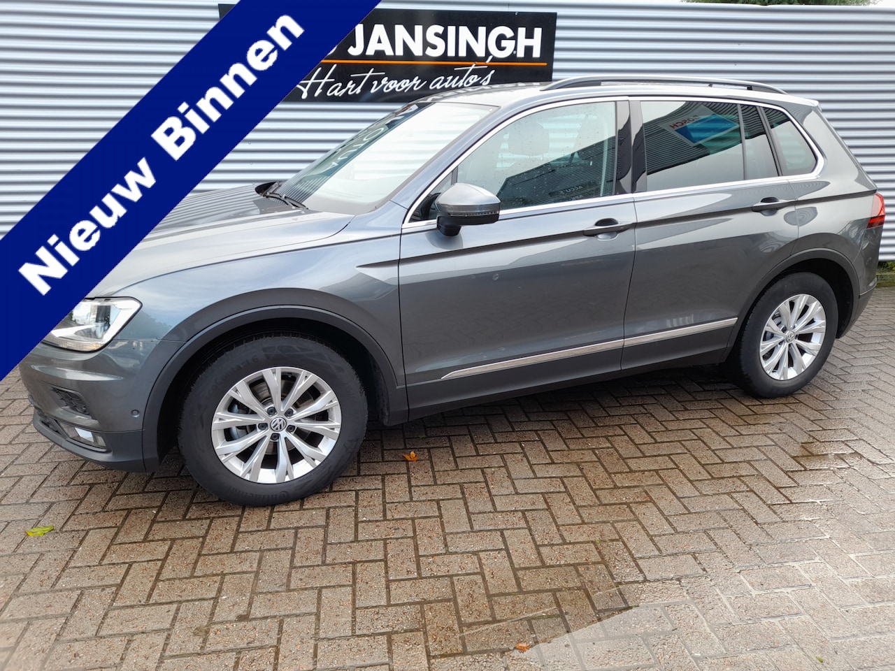 Volkswagen Tiguan - 1.5 TSI ACT Comfortline | Clima | Cruise | Orig. ndl auto | LM Velgen | Navigatie | RIJKLA - AutoWereld.nl