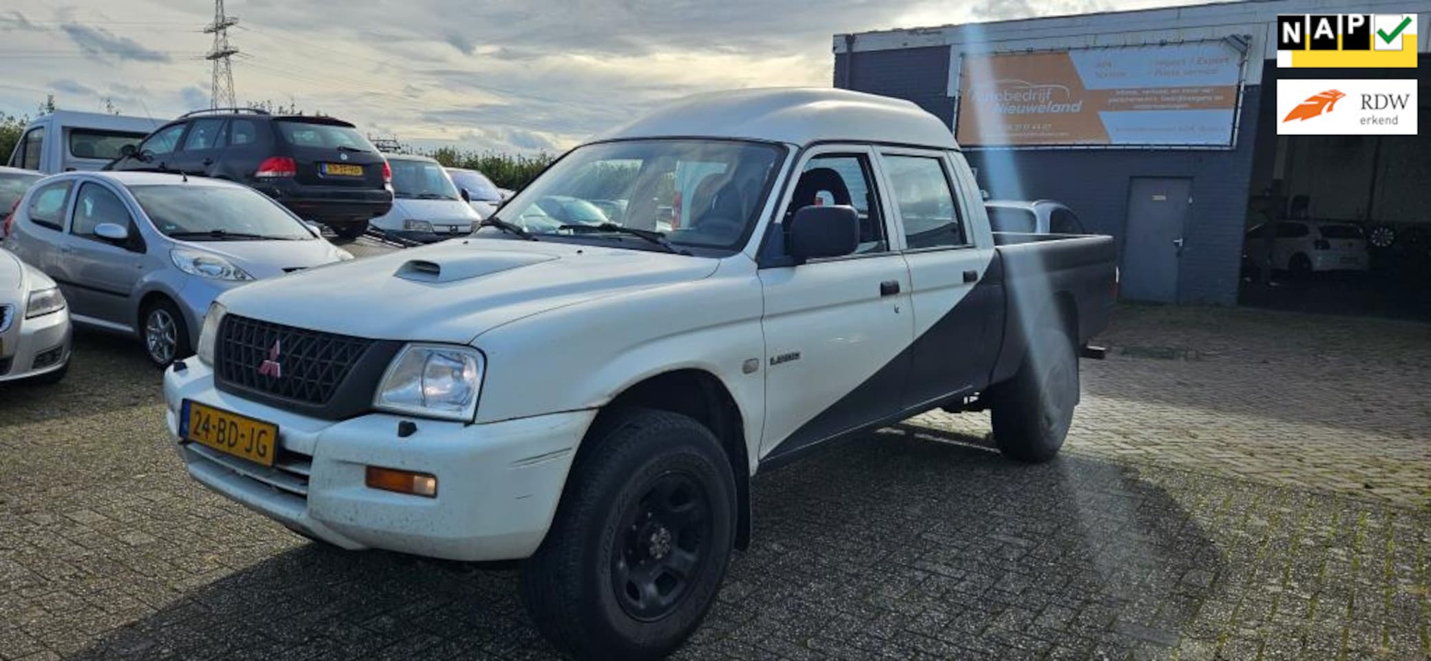 Mitsubishi L 200 - 2.5 TDi Double Cab Instyle Pick Up - AutoWereld.nl