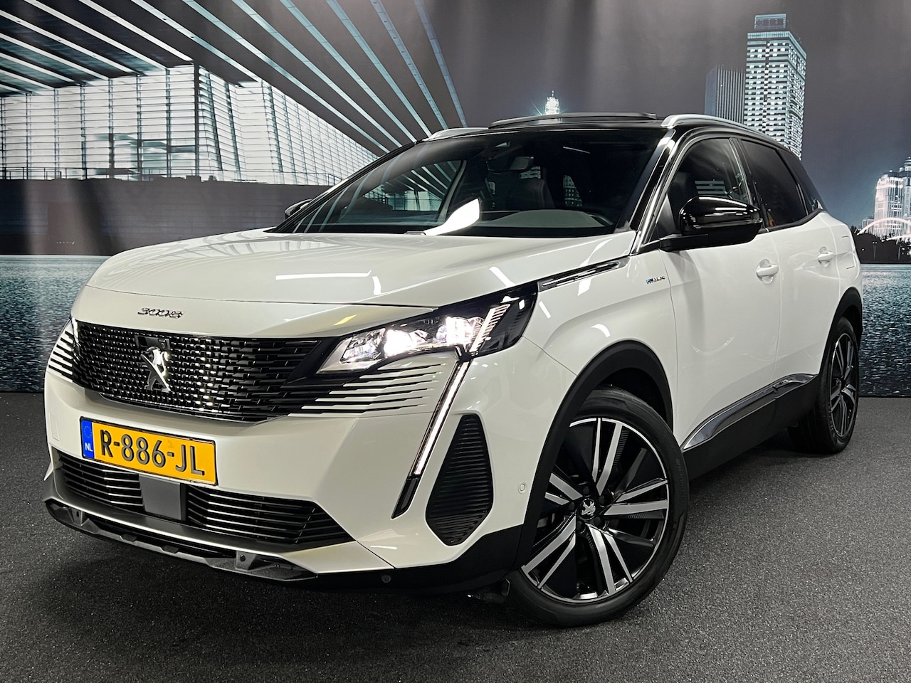 Peugeot 3008 - 1.6 HYbrid4 300 GT PANO/KEYLESS/CARPLAY/FULL - AutoWereld.nl