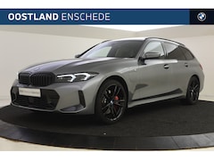 BMW 3-serie Touring - 330e xDrive High Executive M Sport Automaat / Panoramadak / Trekhaak / Stoelverwarming / A