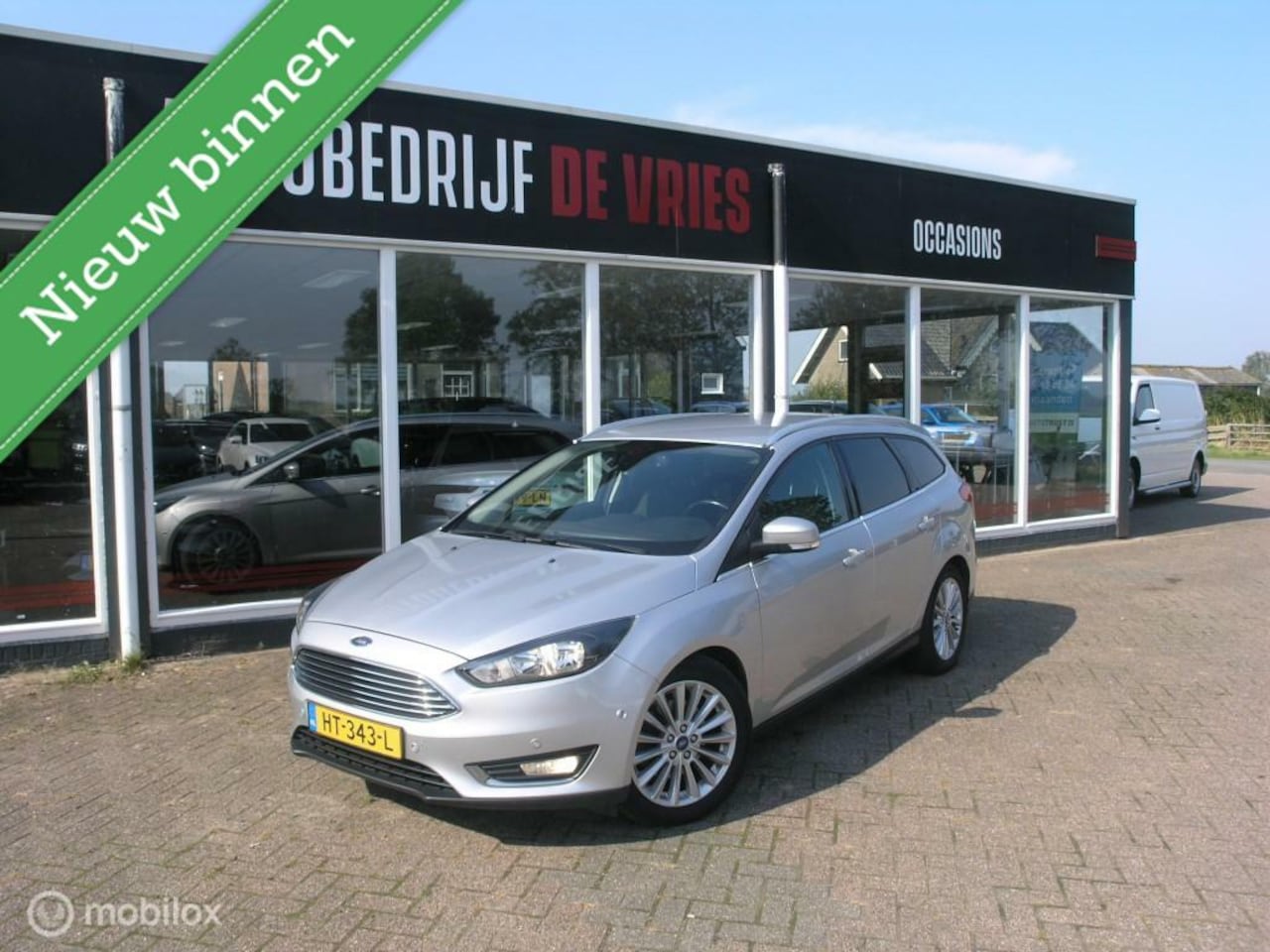 Ford Focus Wagon - 1.5 Titanium Clima/Navi/Winterpakket/Trekhaak - AutoWereld.nl