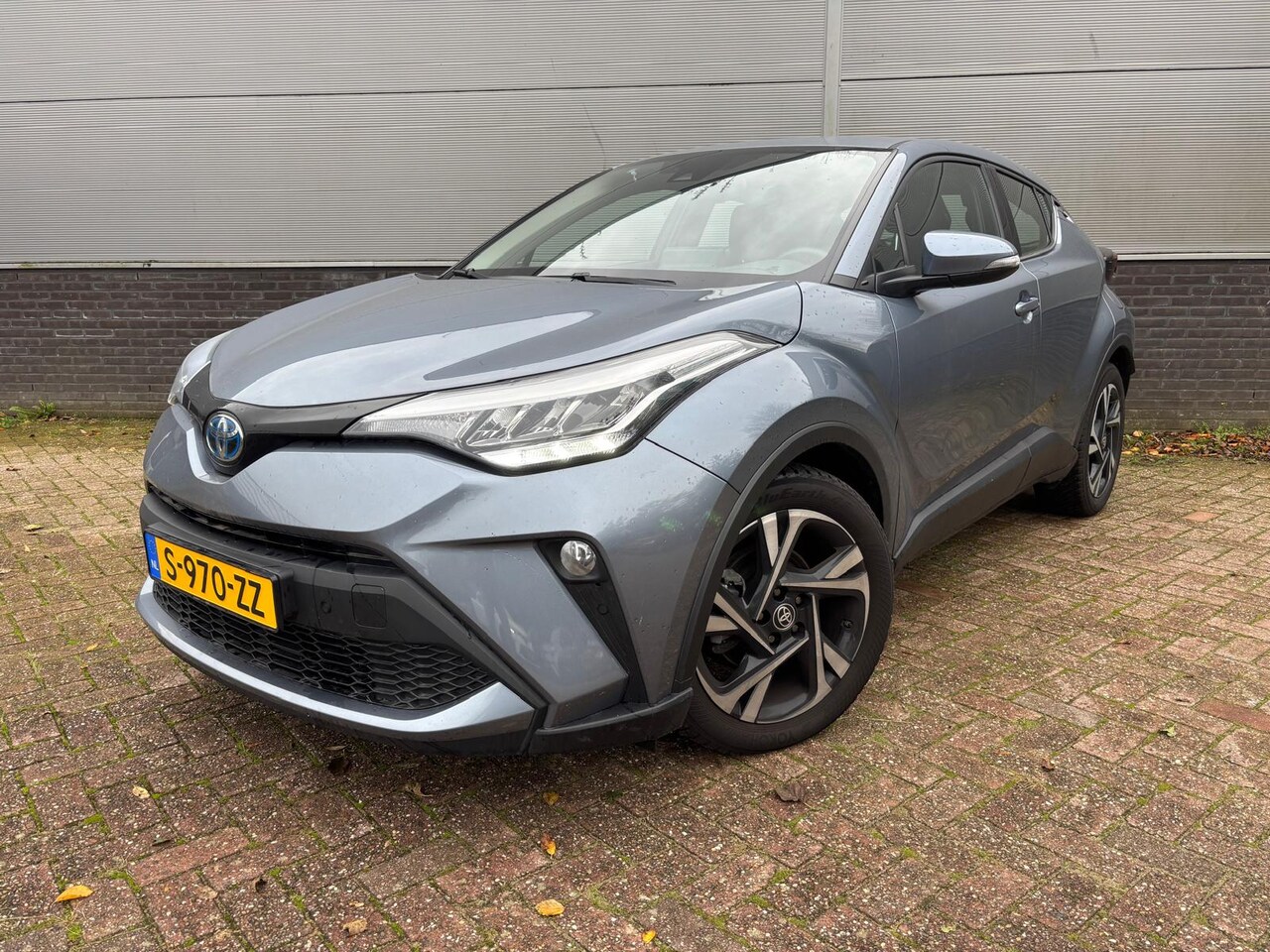 Toyota C-HR - 1.8 Hybrid Dynamic Automaat 122pk Parkeersensoren vóór- & achter  BSM  Apple Carplay/Andro - AutoWereld.nl