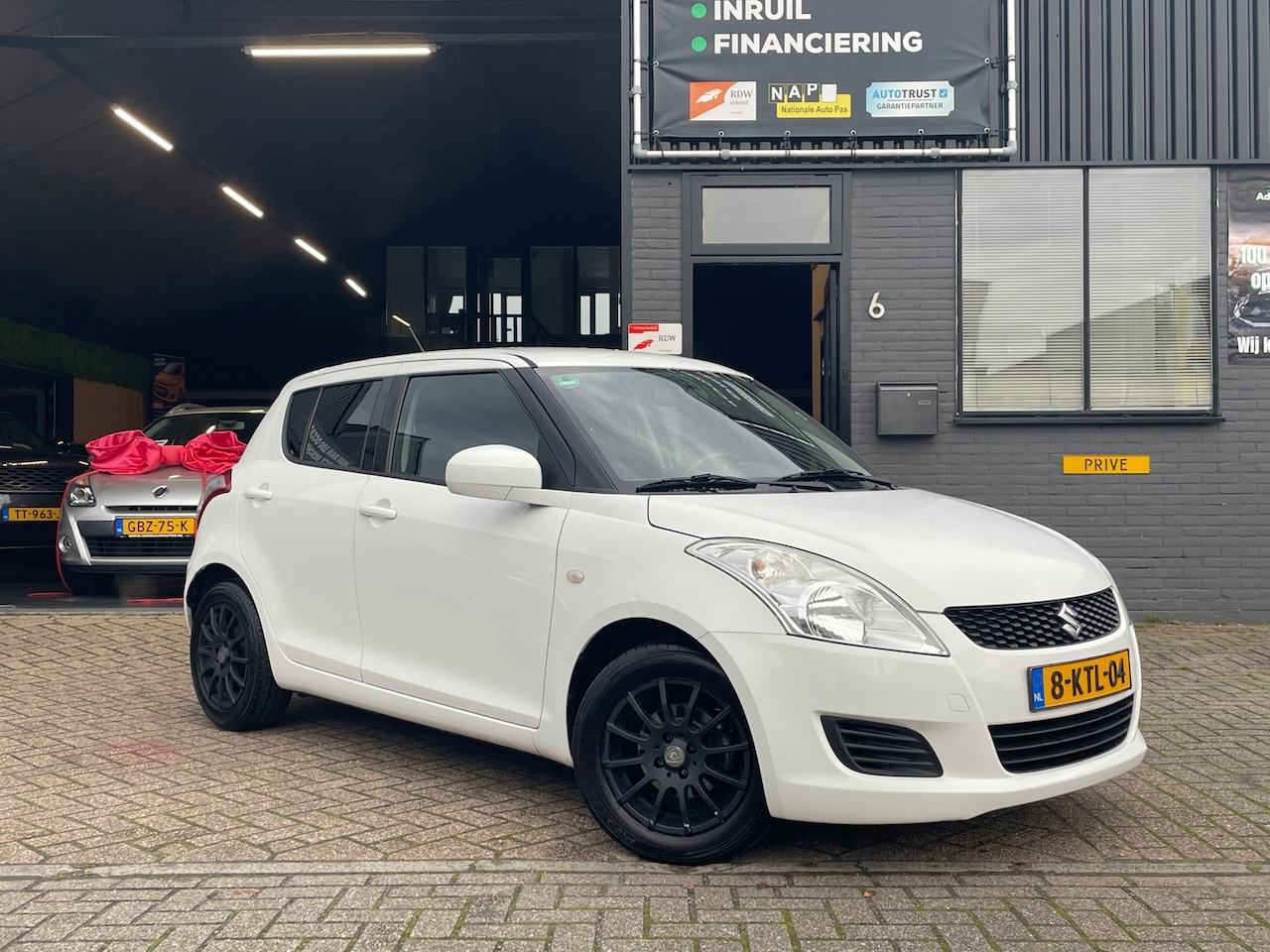 Suzuki Swift - 1.2 Comfort EASSS|Airco|5DRS|Elek. Ramen|APK - AutoWereld.nl