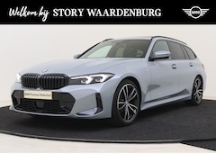 BMW 3-serie Touring - 318i High Executive M Sport Automaat / Panoramadak / Trekhaak / Sportstoelen / Stoelverwar