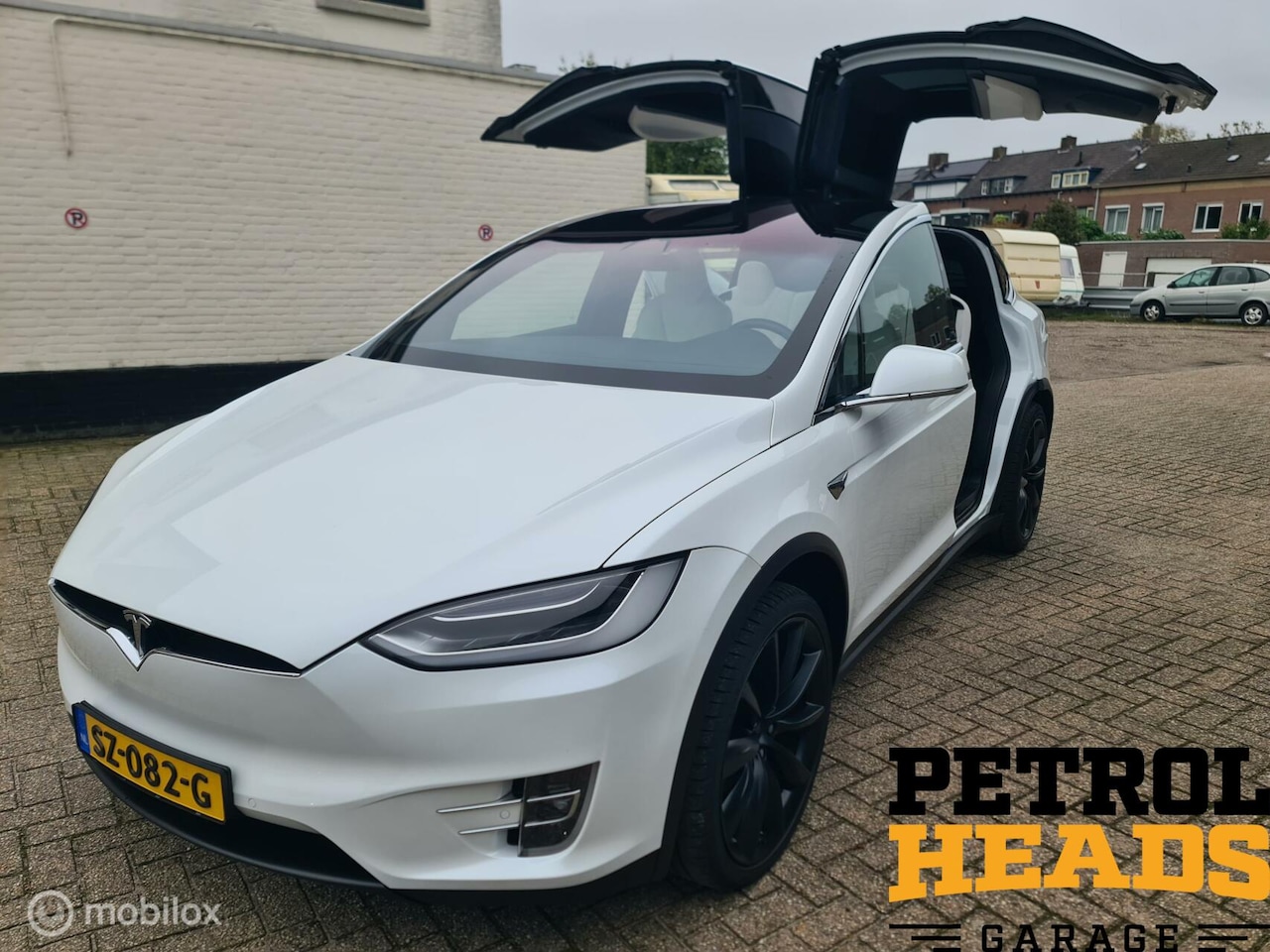 Tesla Model X - 100D 4x4 Long Range 7p. Black on White 22inch Fabrieksgarantie 6-2026 Enh. Autopliot 2.5 + - AutoWereld.nl