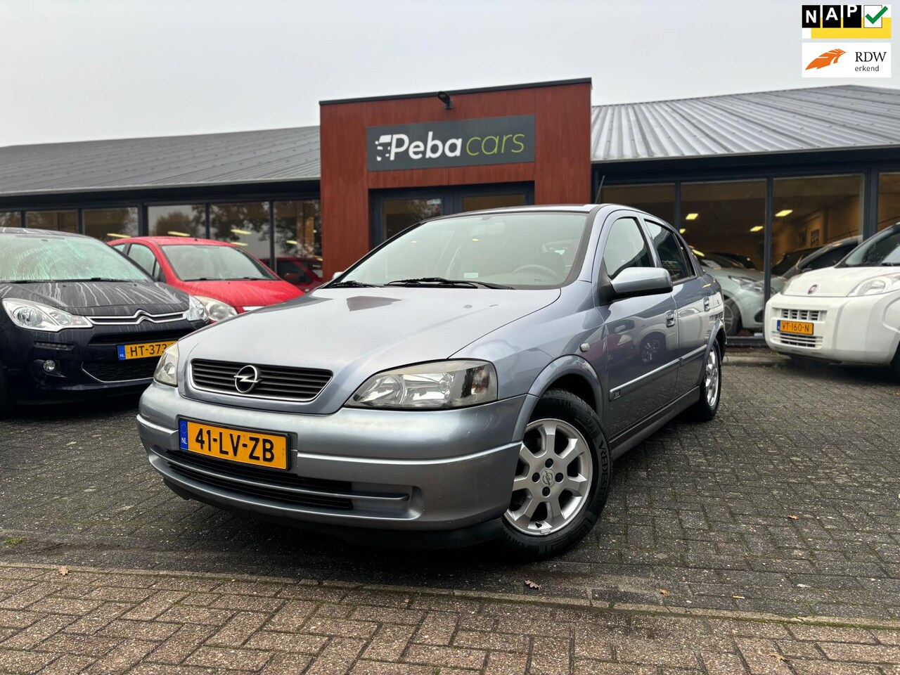 Opel Astra - 1.6 Njoy / Airco / Cruise control / L.M velgen - AutoWereld.nl