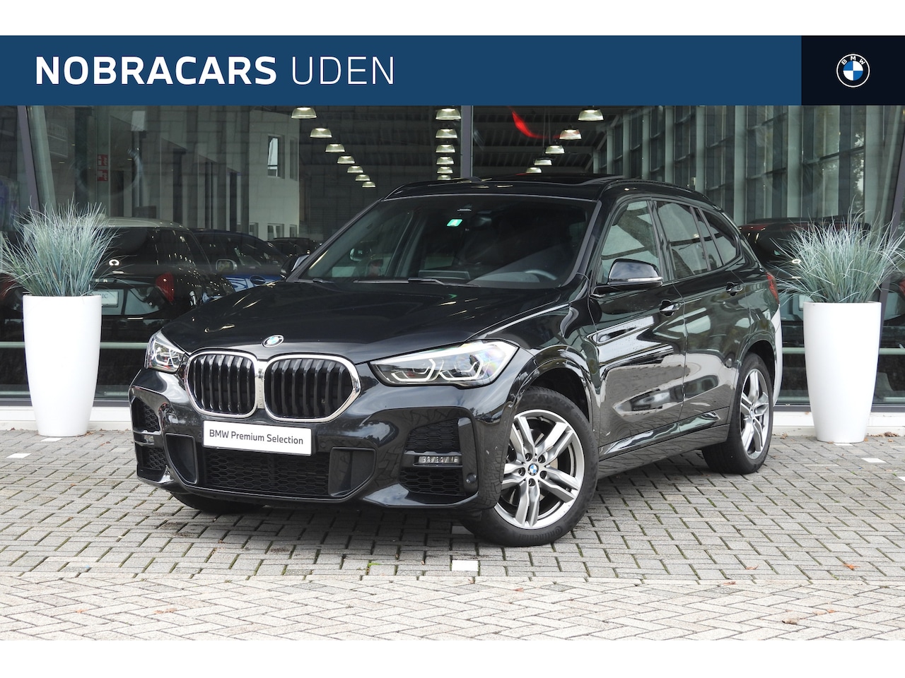 BMW X1 - sDrive20i High Executive M Sport Automaat / Panoramadak / Sportstoelen / LED / Head-Up / M - AutoWereld.nl