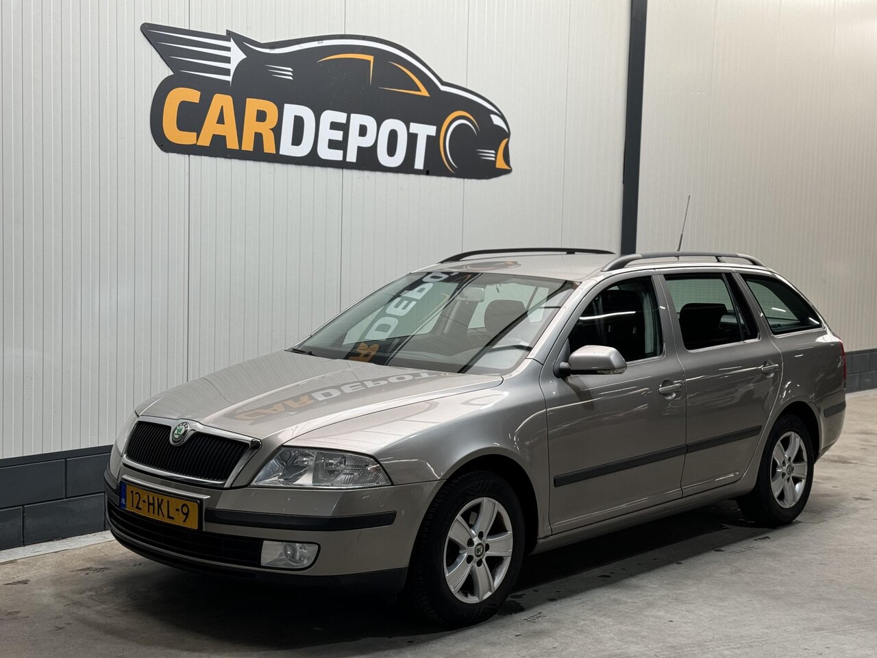 Skoda Octavia Combi - 1.6 FSI Tour 1.6 FSI Tour - AutoWereld.nl