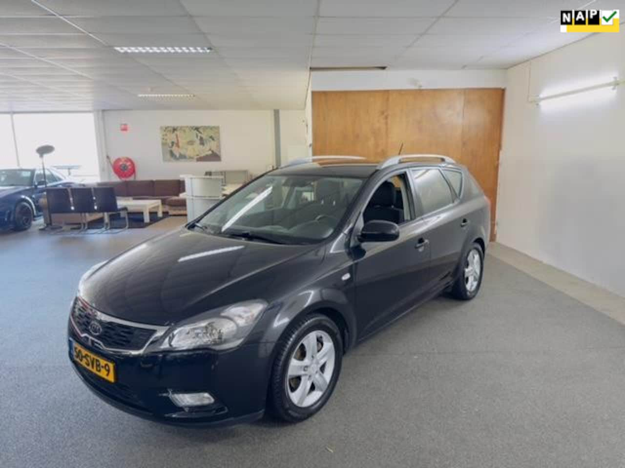 Kia Cee'd Sporty Wagon - 1.4 CVVT Navigator Plus Pack Airco,Cruise,Camera,Navigatie,Trekhaak,N.A.P,Topstaat!! - AutoWereld.nl