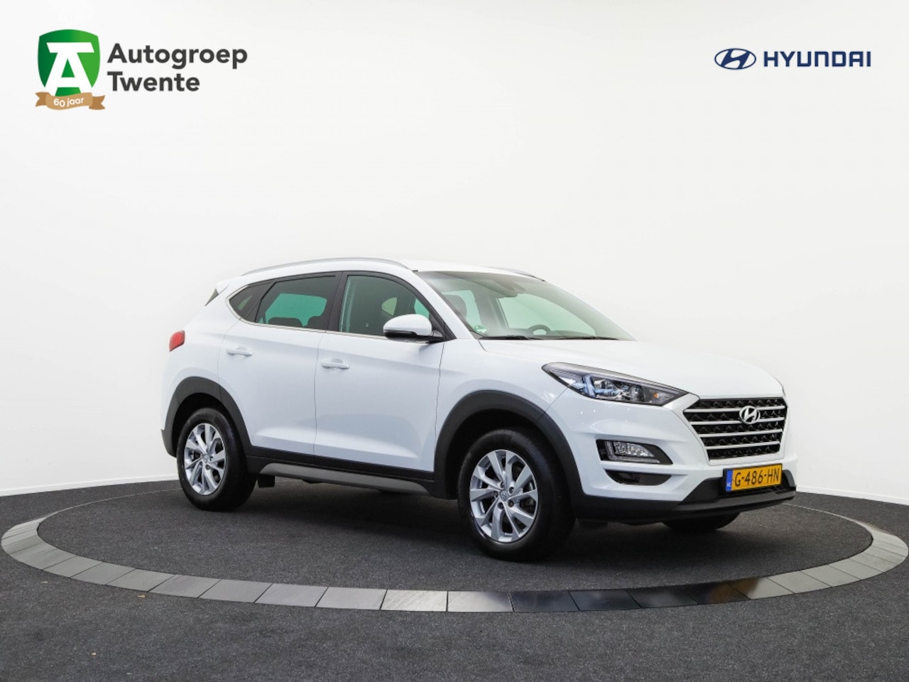 Hyundai Tucson - 1.6 GDI Comfort | DAB | Carplay | Cruise Control | Airco - AutoWereld.nl