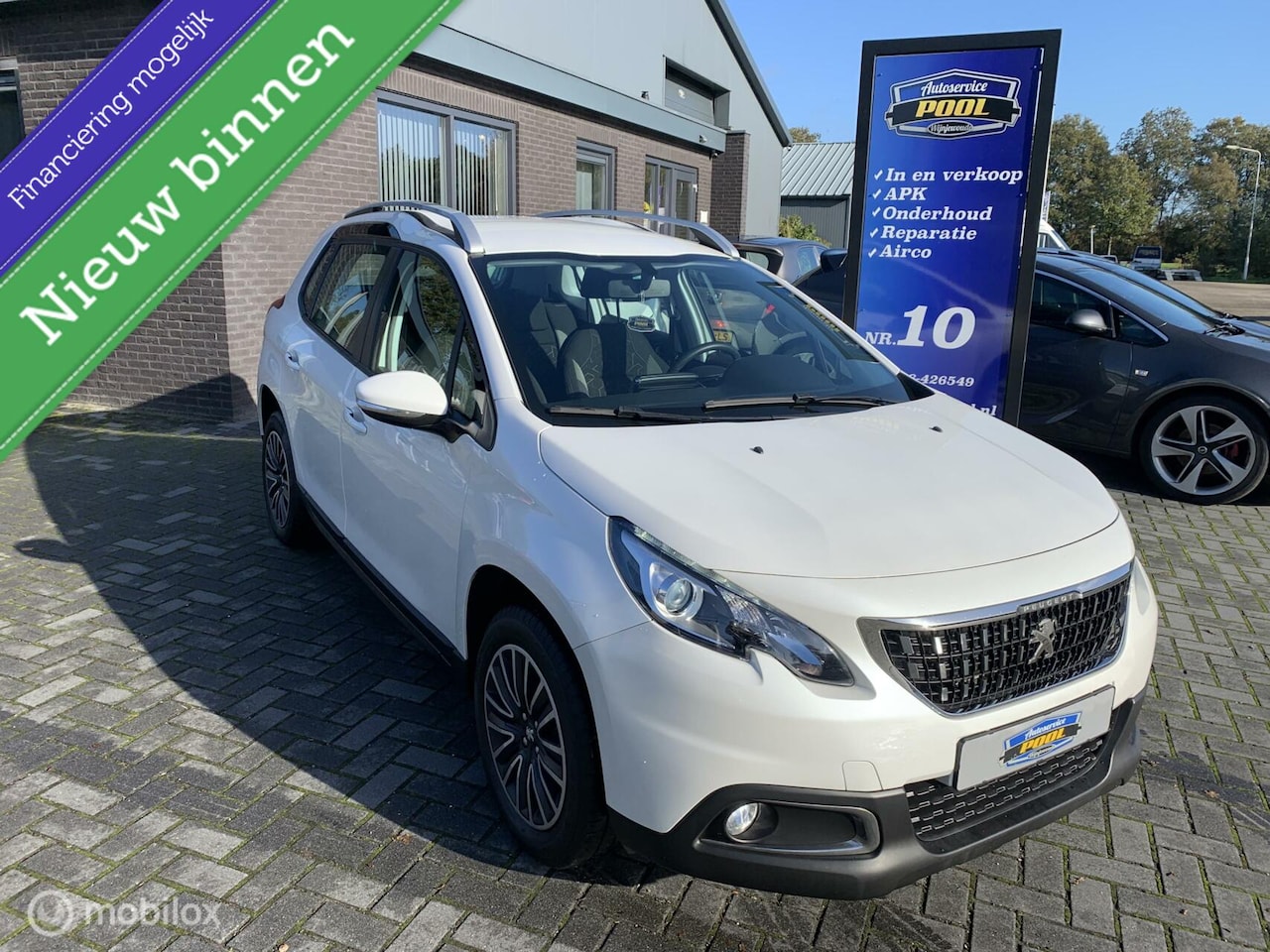 Peugeot 2008 - 1.2 PureTech Allure NAVI| Cruise - AutoWereld.nl