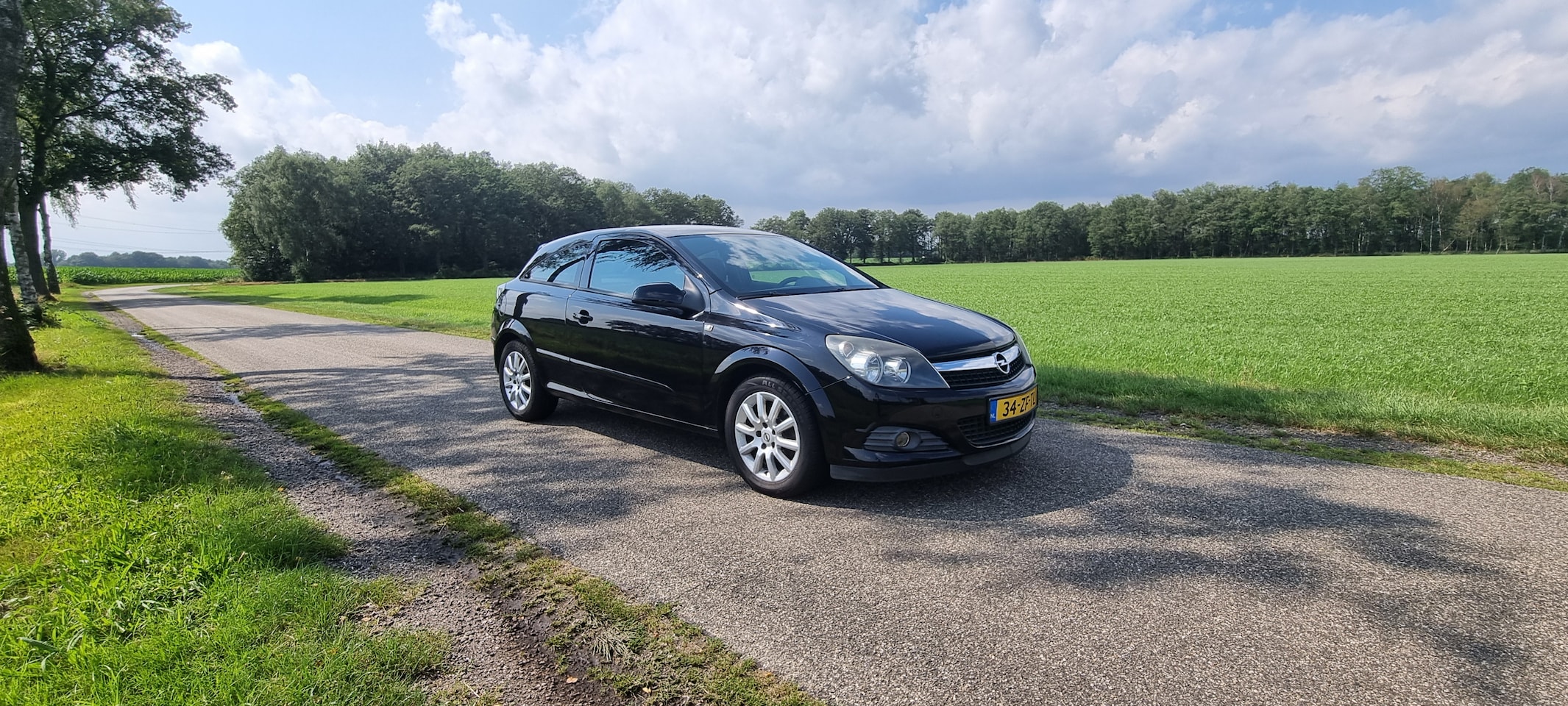 Opel Astra GTC - 1.6 Temptation - AutoWereld.nl