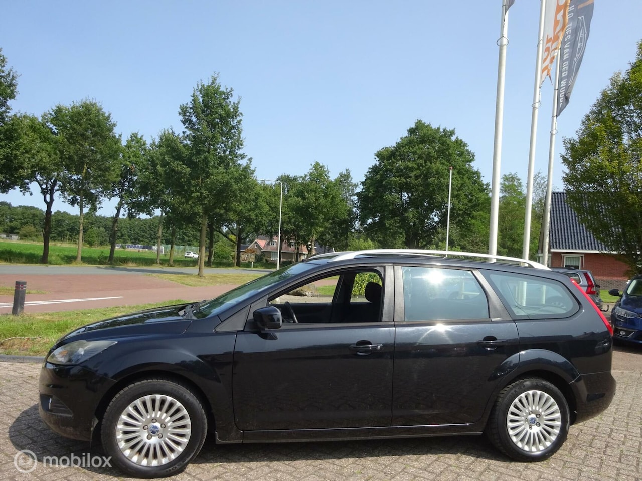 Ford Focus Wagon - 1.8 Titanium 2010 Clima|Cruise|Navi! - AutoWereld.nl