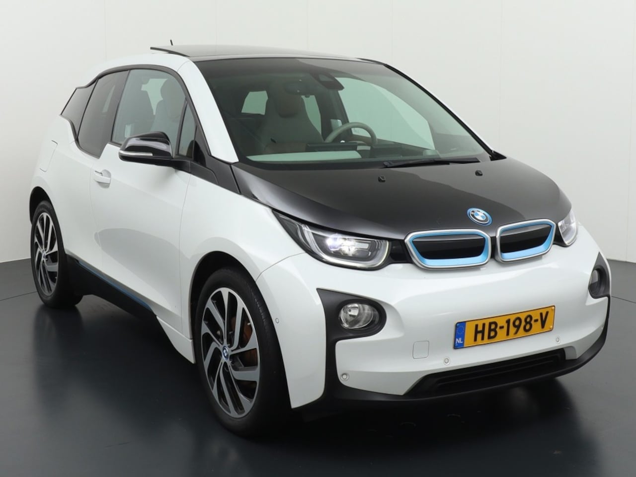 BMW i3 - COMFORT ADVANCE  PANO DAK ,NAV,PCD.CAMERA - AutoWereld.nl