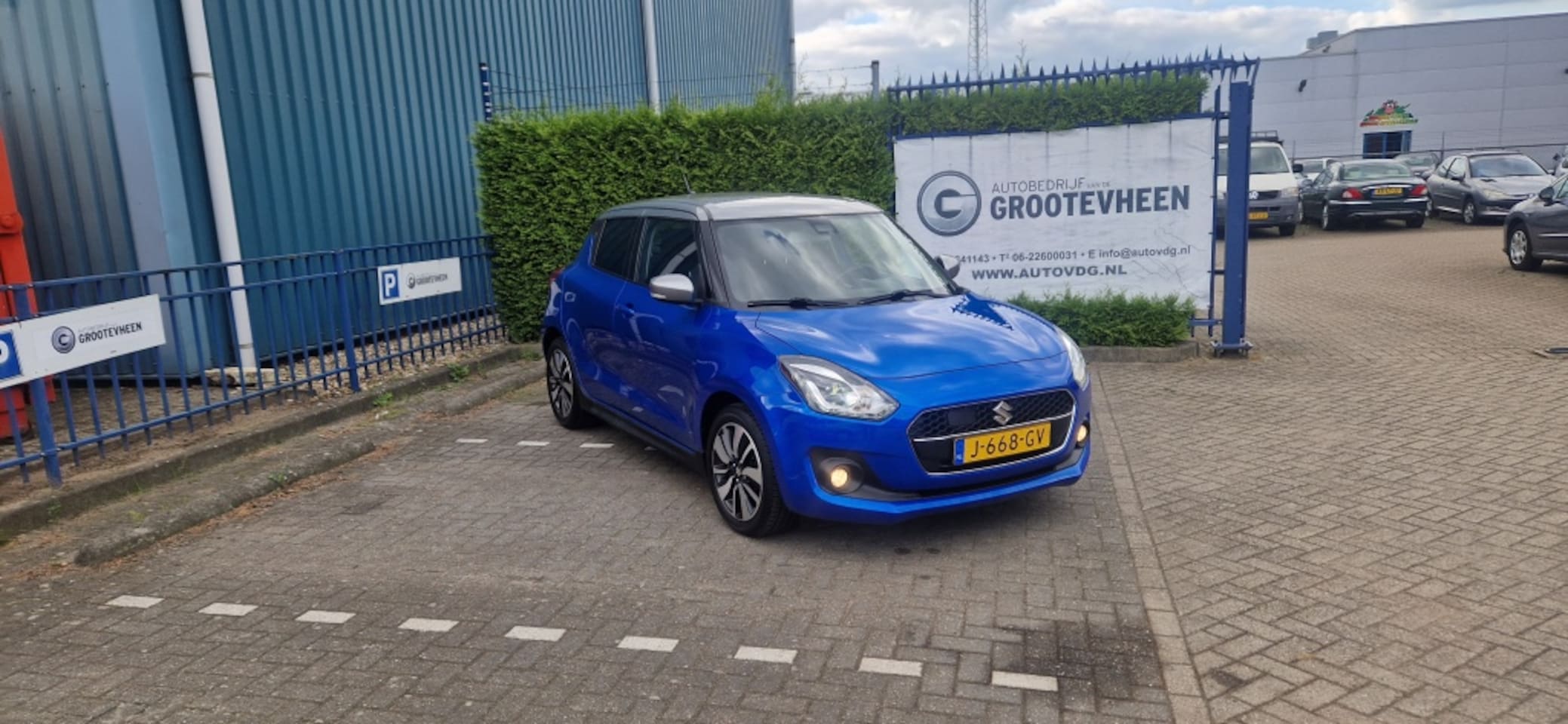 Suzuki Swift - 1.2 Stijl Smart Hybr - AutoWereld.nl