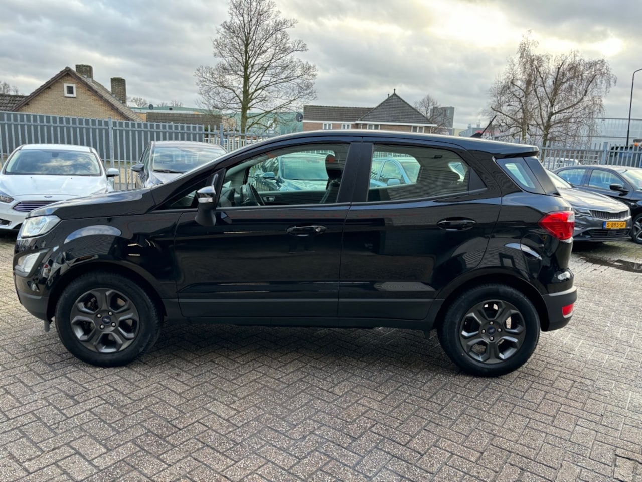 Ford EcoSport - 1.0i Style 1 JAAR GAR AIRCO NAVI SPORTVELGEN TREKHAAK CRUISE CON - AutoWereld.nl