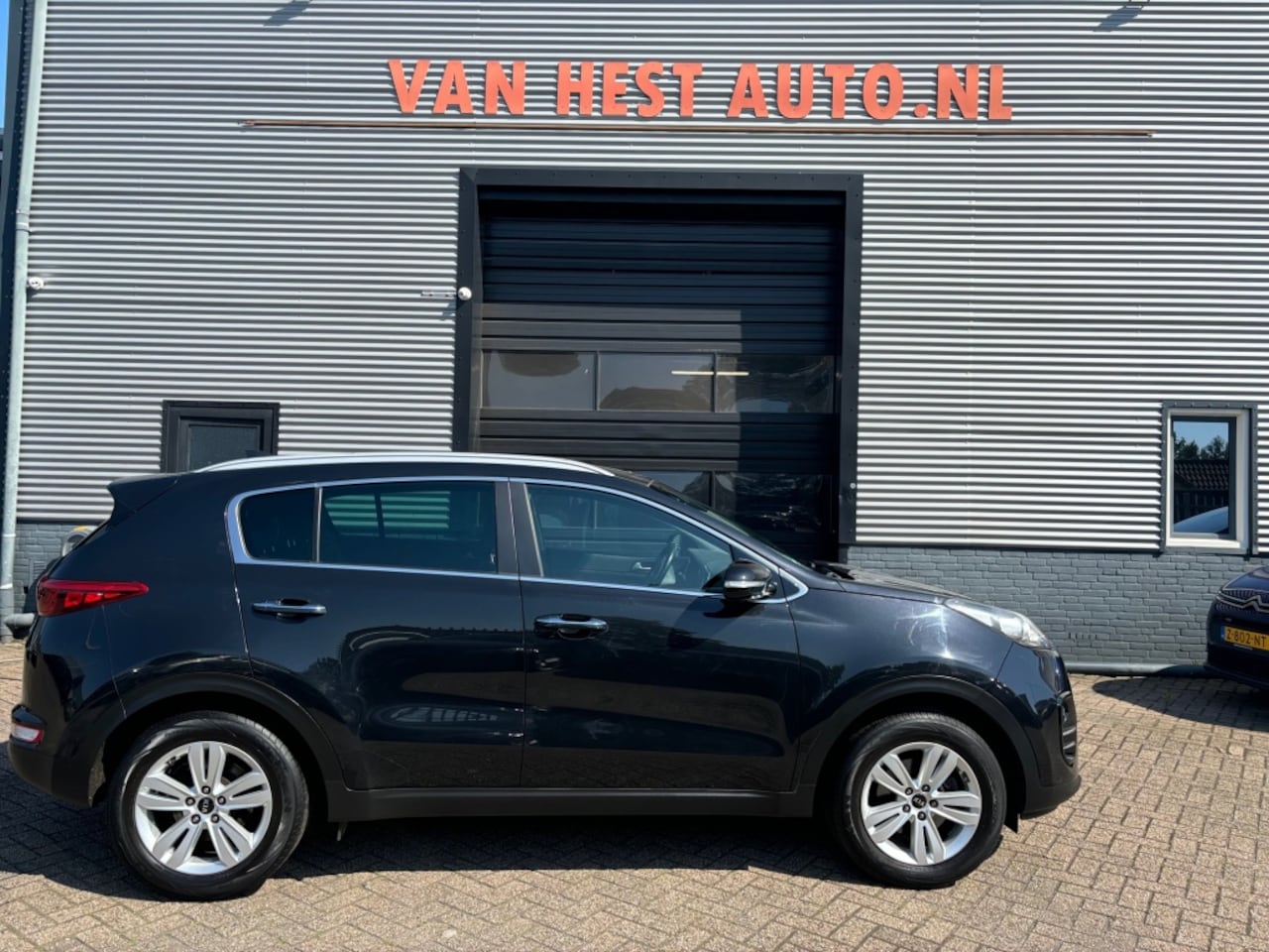 Kia Sportage - 1.6 GDi Vision 6 MND GAR LEER NAVI ECC TREKHAAK SPORTVELGEN PD - AutoWereld.nl