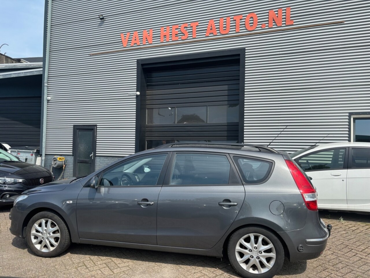 Hyundai i30 CW - 2.0i i-Catcher LPG G3 AUTOM. 3 MND GAR CLIMA SPORTVELGEN TREKHAA - AutoWereld.nl