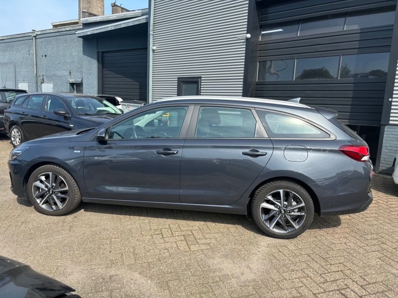 Hyundai i30 Wagon - 1.0 T-GDi MHEV ComSm CLIMA NAVI SPORTVELGEN - AutoWereld.nl