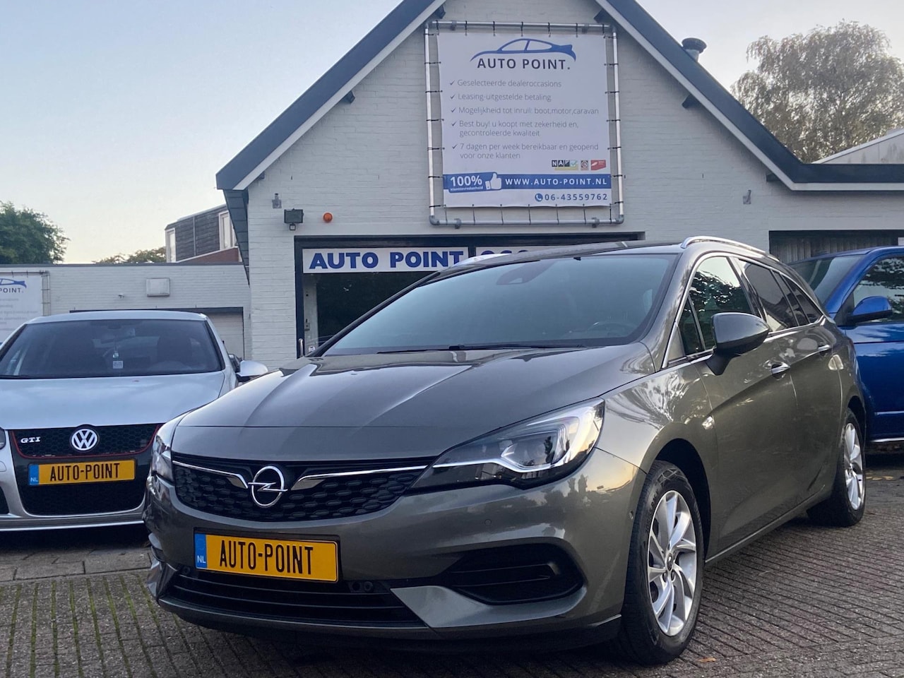 Opel Astra Sports Tourer - 1.2 COPILOT/NAVI/CRUISE/VIRTUAL/KEYLESS/CAMERA - AutoWereld.nl