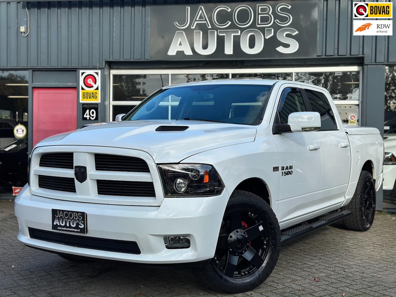 Dodge Ram 1500 - 5.7 V8 4x4 Crew Cab 6'4 5.7 V8 4x4 CrewCab 6'4 - AutoWereld.nl