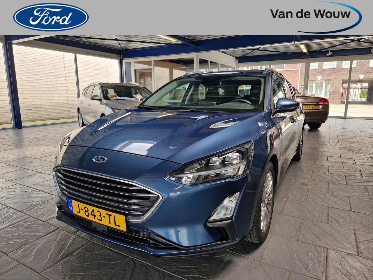 Ford Focus Wagon - 1.0 EcoBoost Titanium 125pk Wagon Afn.Trekhaak. Navi/winterpakket - AutoWereld.nl