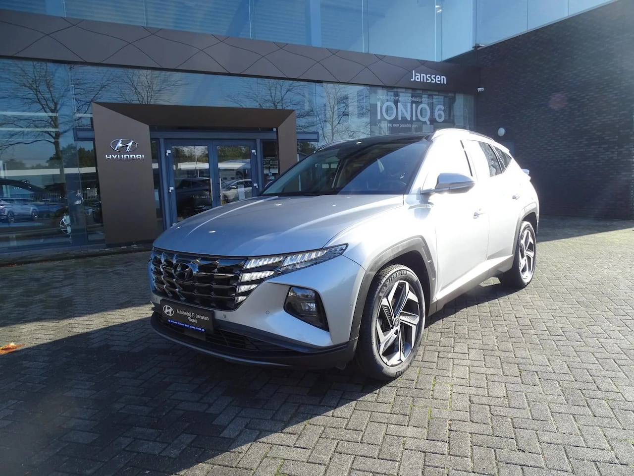 Hyundai Tucson - 1.6 T-GDI HEV Premium Sky 1.6 T-GDI HEV Premium SKY - AutoWereld.nl