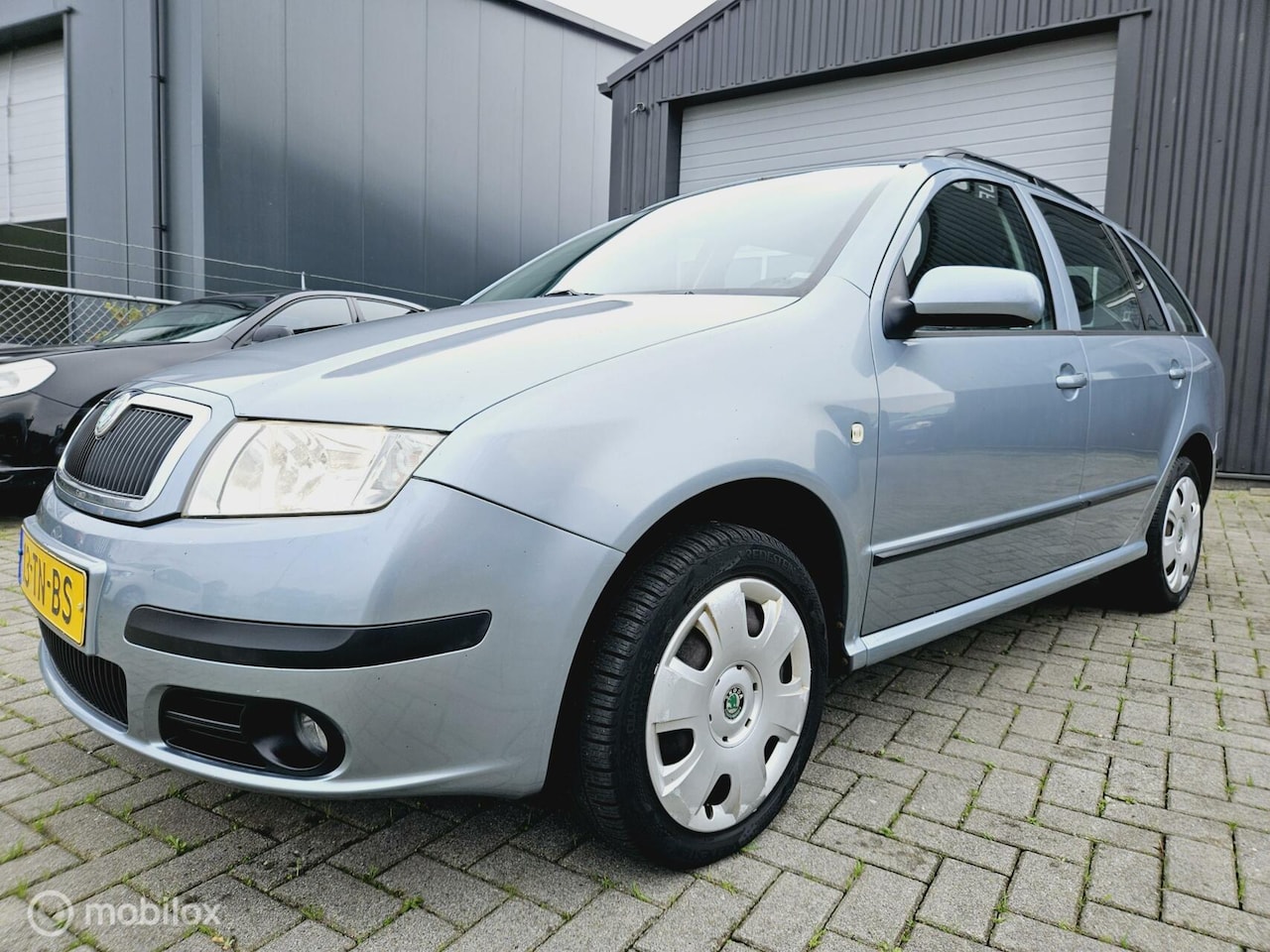 Skoda Fabia Combi - 1.4-16V Spirit+ VASTEPRIJS - AutoWereld.nl