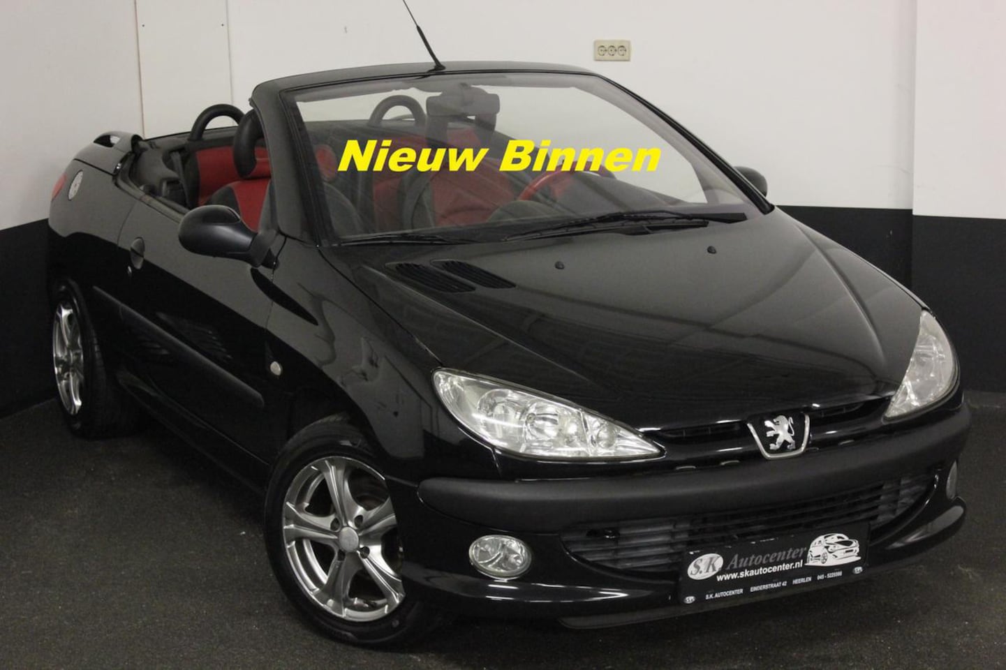 Peugeot 206 - CABRIO 1.6.16V ZWART-ROOD LEDER TREKHAAK*MOOI* - AutoWereld.nl