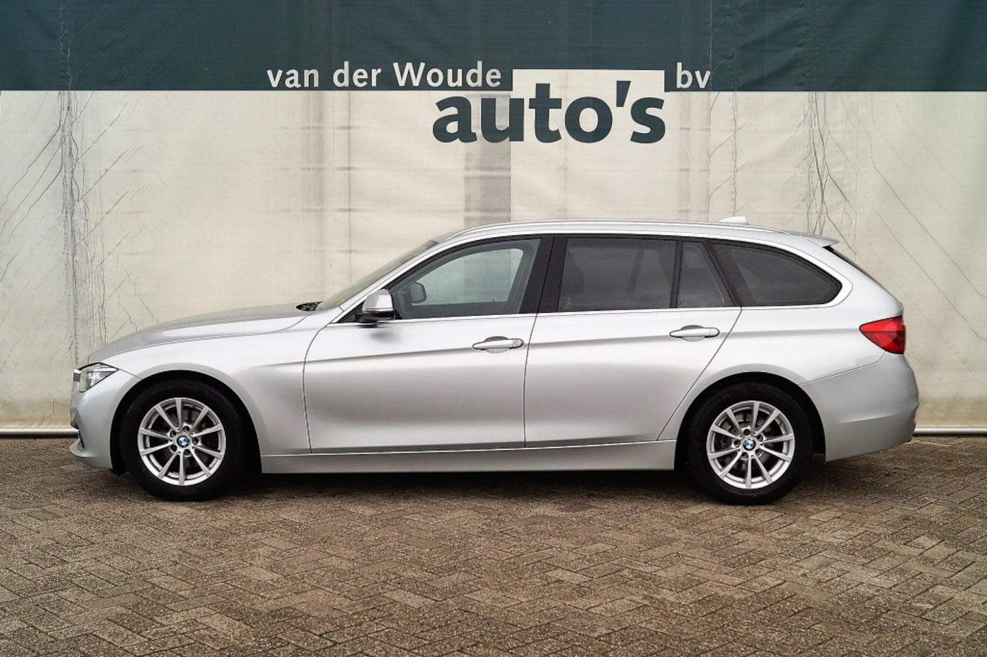 BMW 3-serie Touring - 320d 163pk Automaat High Executive -LEER- - AutoWereld.nl