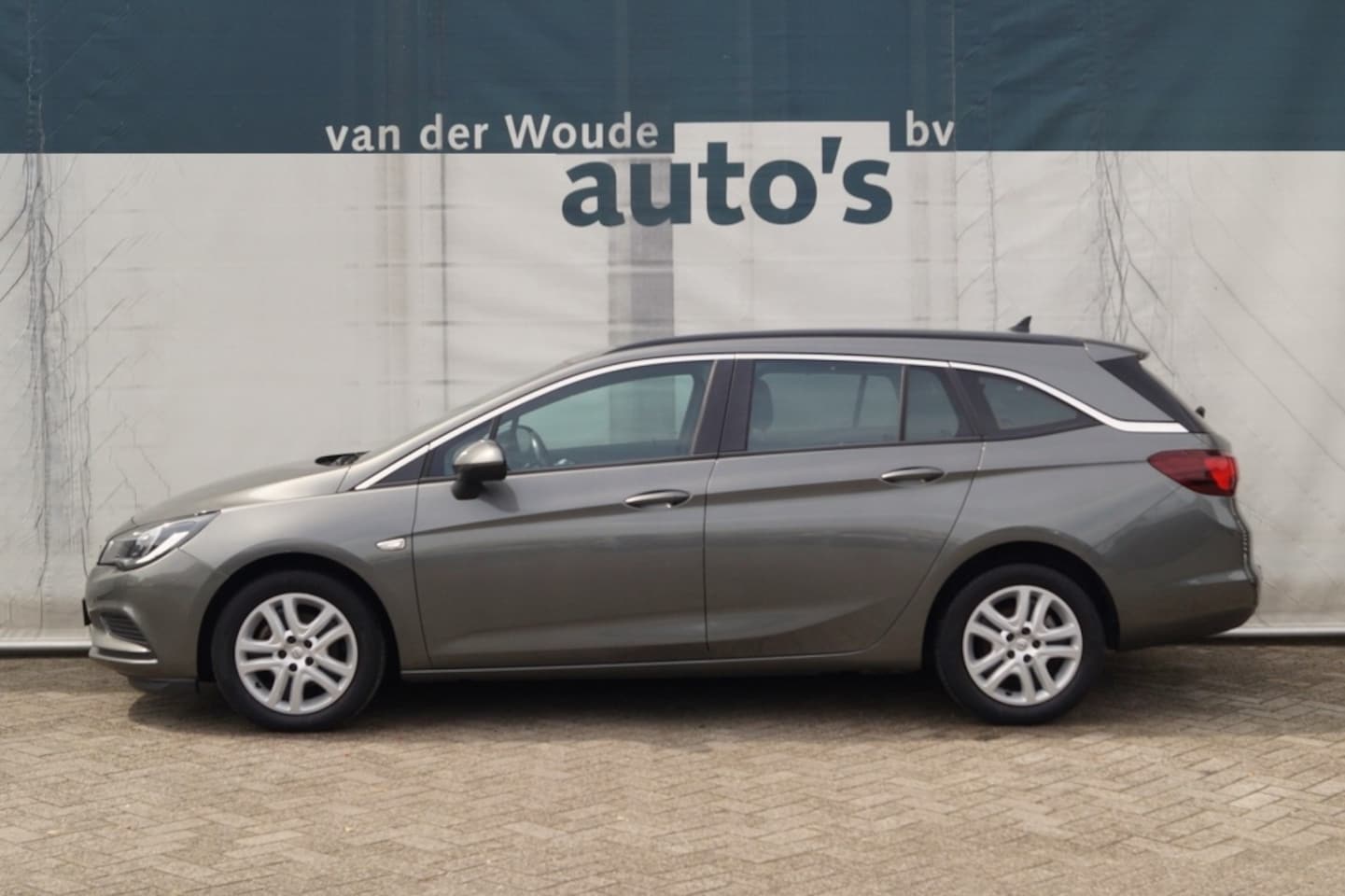 Opel Astra Sports Tourer - 1.6 CDTI Business+ -NAVI-PDC- - AutoWereld.nl