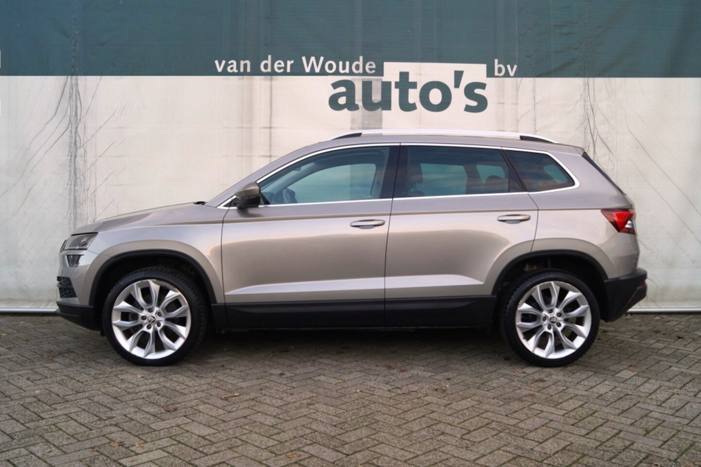 Skoda Karoq - 1.0 TSI Style Business -LED-ECC-NAVI-CAM-PDC- - AutoWereld.nl